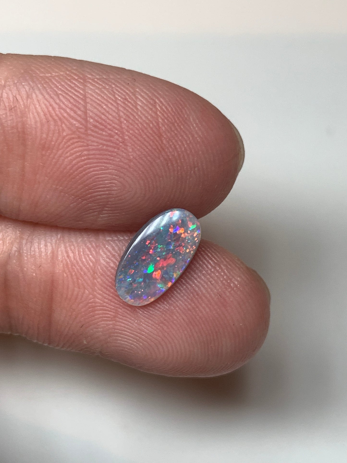 Red Stars. Lightning Ridge Semi- Black Opal. 0.67 Ct