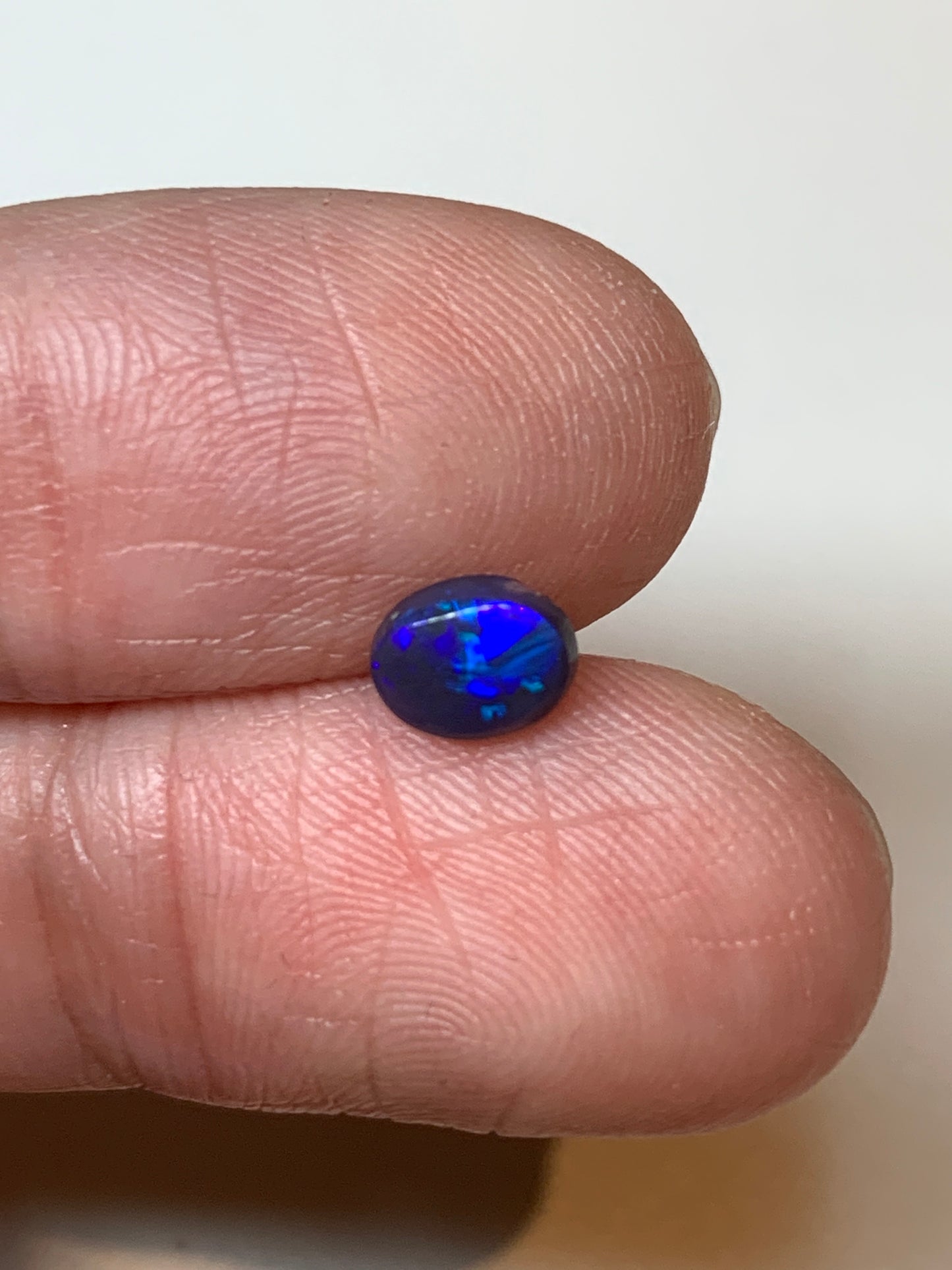 Petite Purple. Lightning Ridge Black Opal Pair. 0.75 Ct