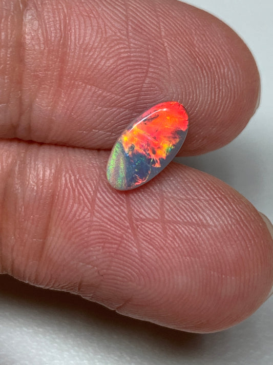 Red Fire. Lightning Ridge Solid Black Opal. 0.68 Ct