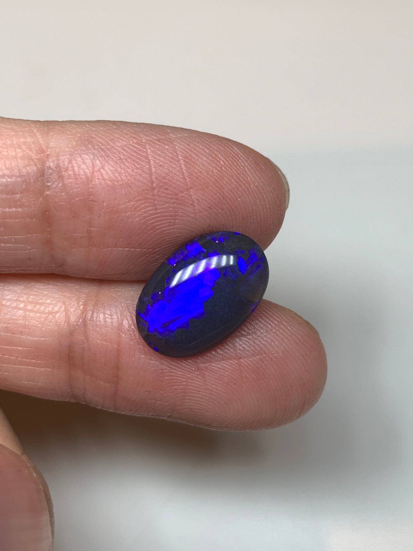Dazzling Blue Violets. Lightning Ridge Black Opal. 3.33 Ct