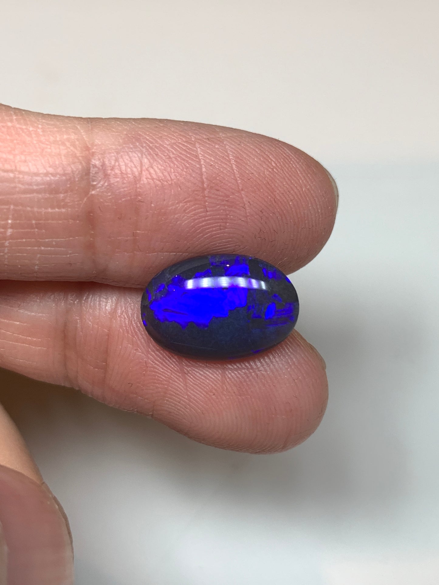 Dazzling Blue Violets. Lightning Ridge Black Opal. 3.33 Ct