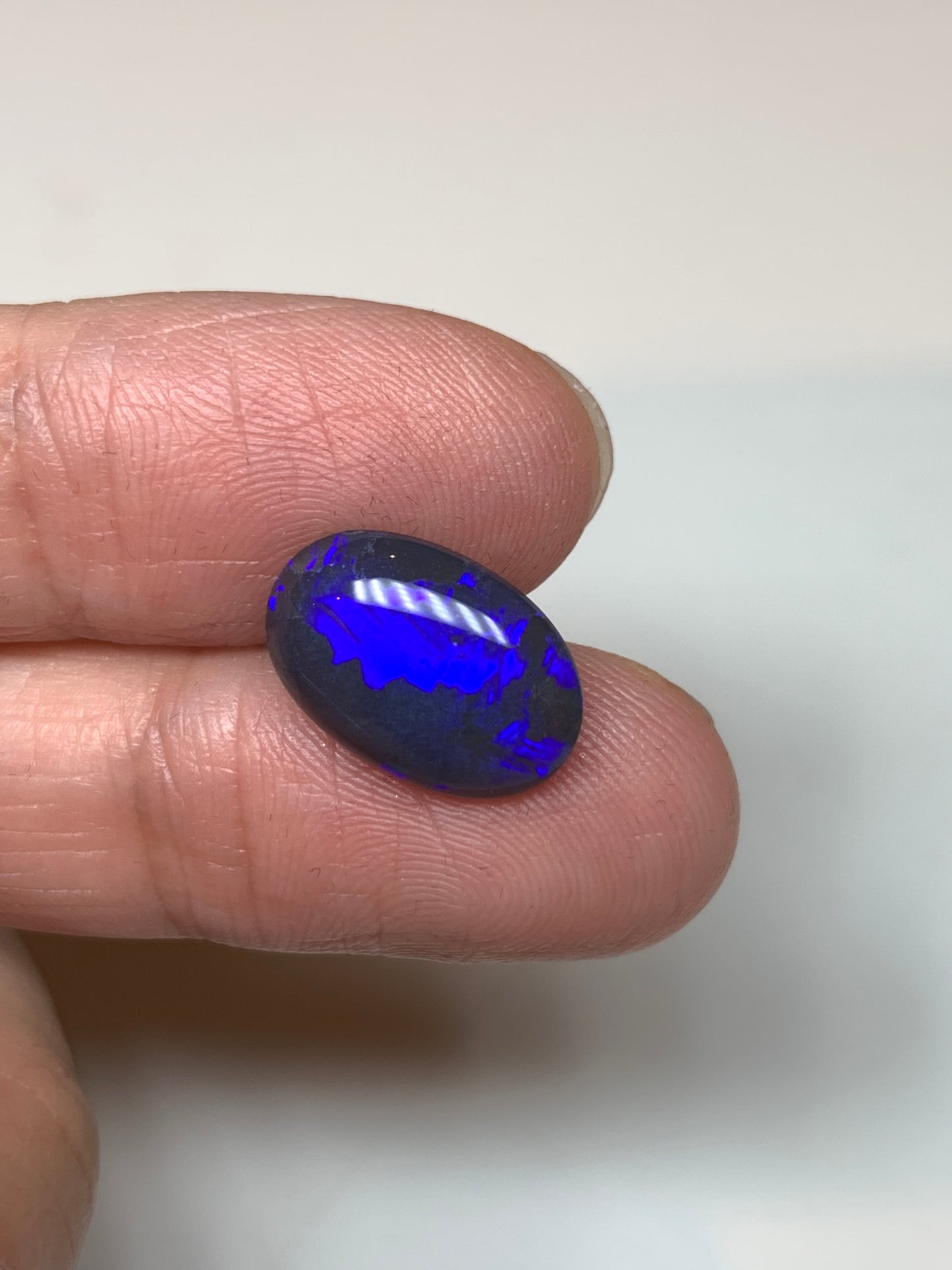 Dazzling Blue Violets. Lightning Ridge Black Opal. 3.33 Ct