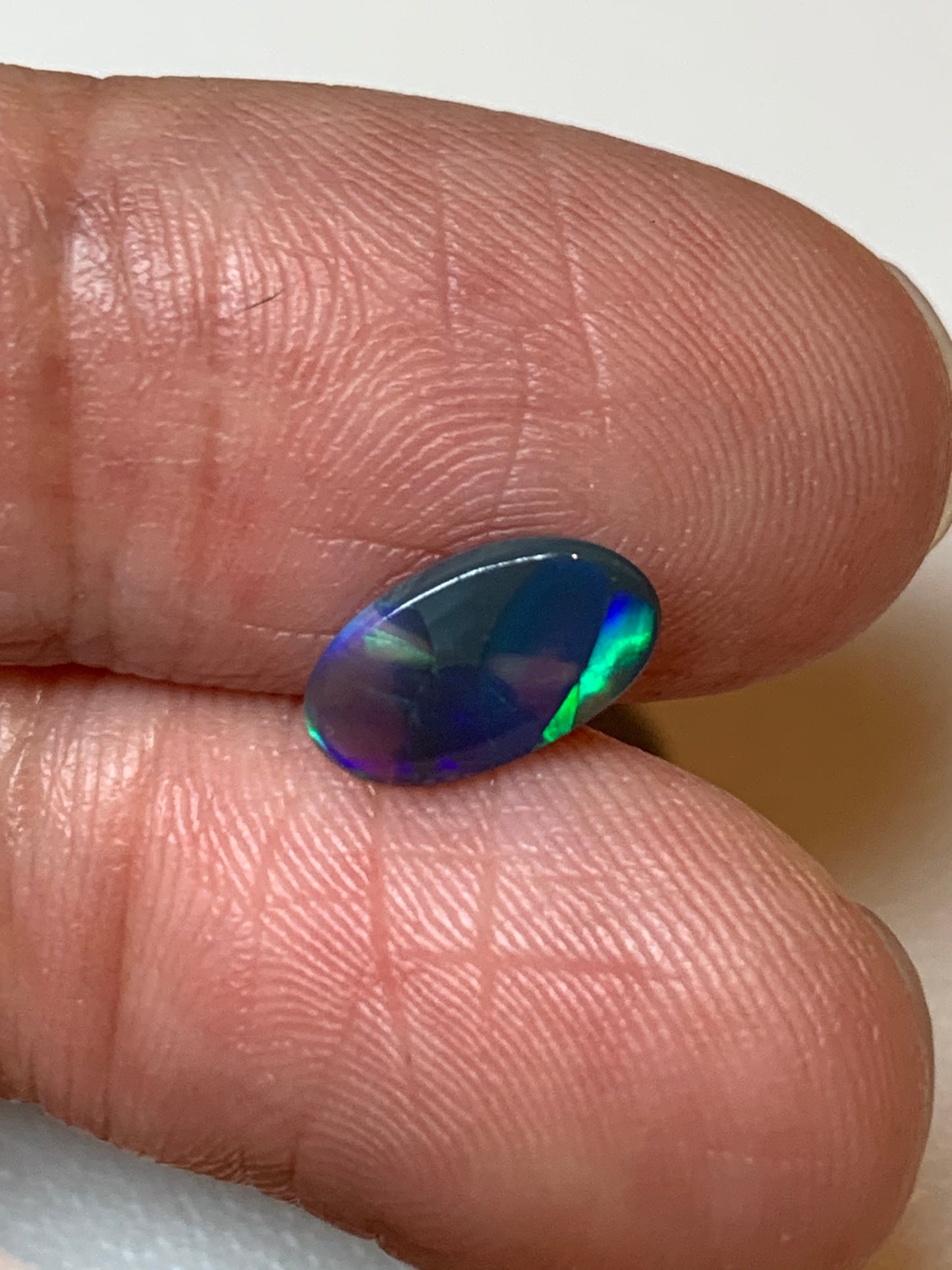 Flashy Green. Lightning Ridge Black Opal. 0.54 Ct