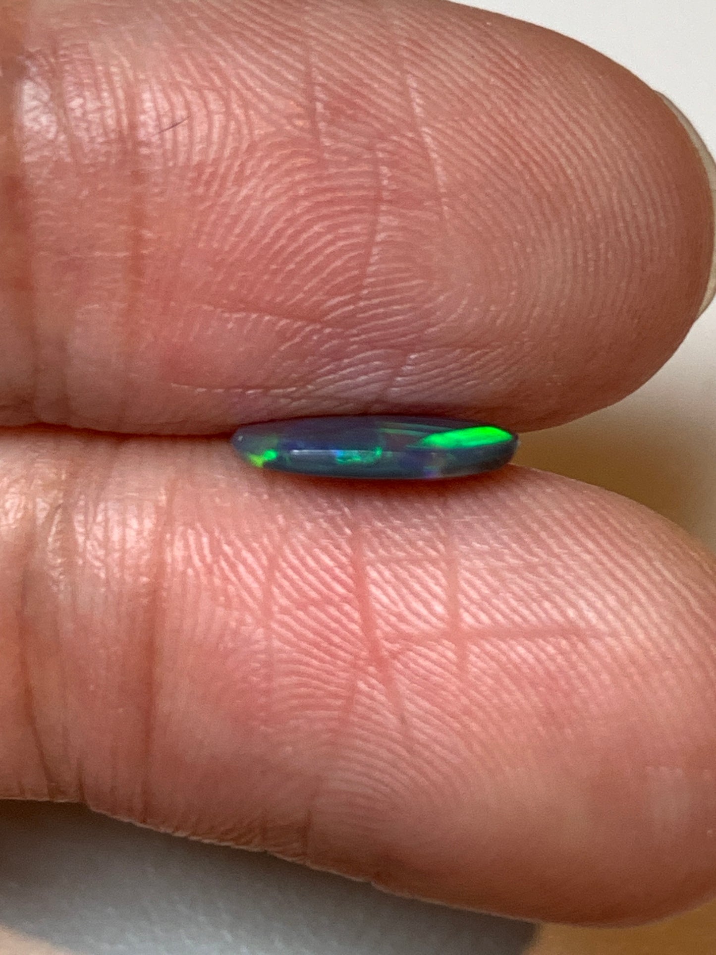Flashy Green. Lightning Ridge Black Opal. 0.54 Ct