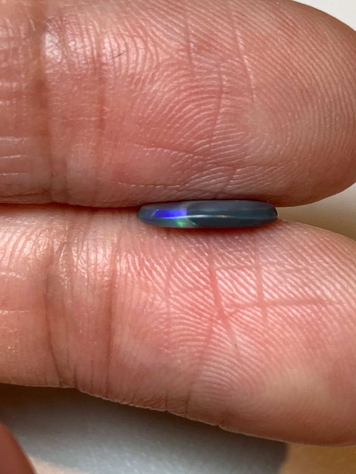 Flashy Green. Lightning Ridge Black Opal. 0.54 Ct