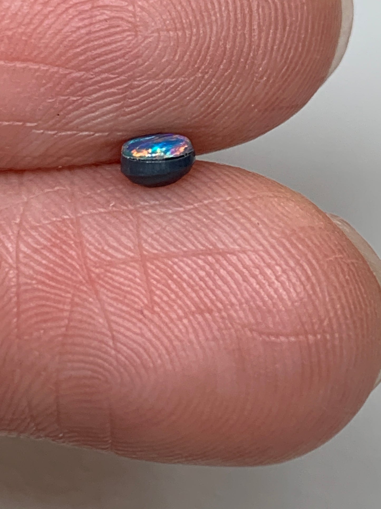 Red Head Cutie. Lightning Ridge Doublet Black Opal. 0.19 Ct