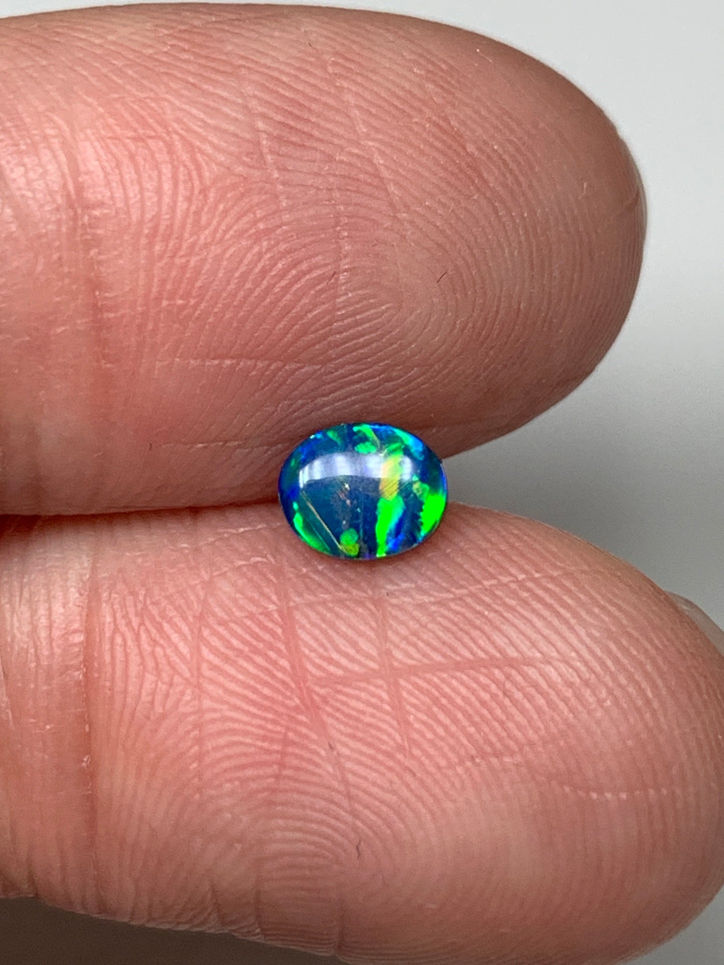 Vibrant Lines. Lightning Ridge Doublet Black Opal. 0.34 Ct