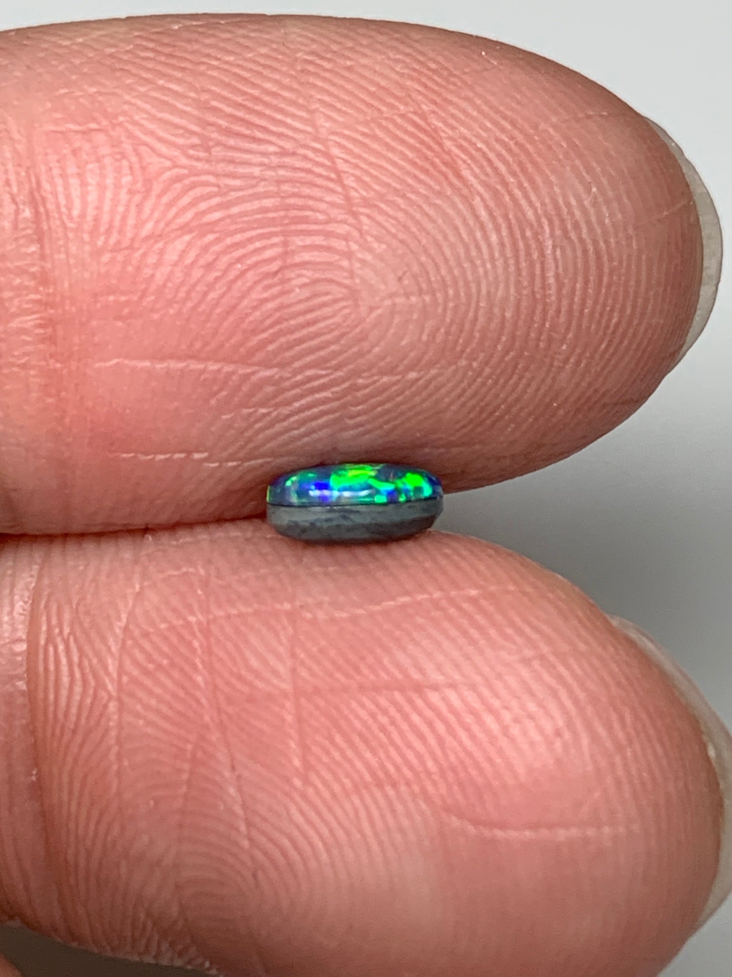 Vibrant Lines. Lightning Ridge Doublet Black Opal. 0.34 Ct