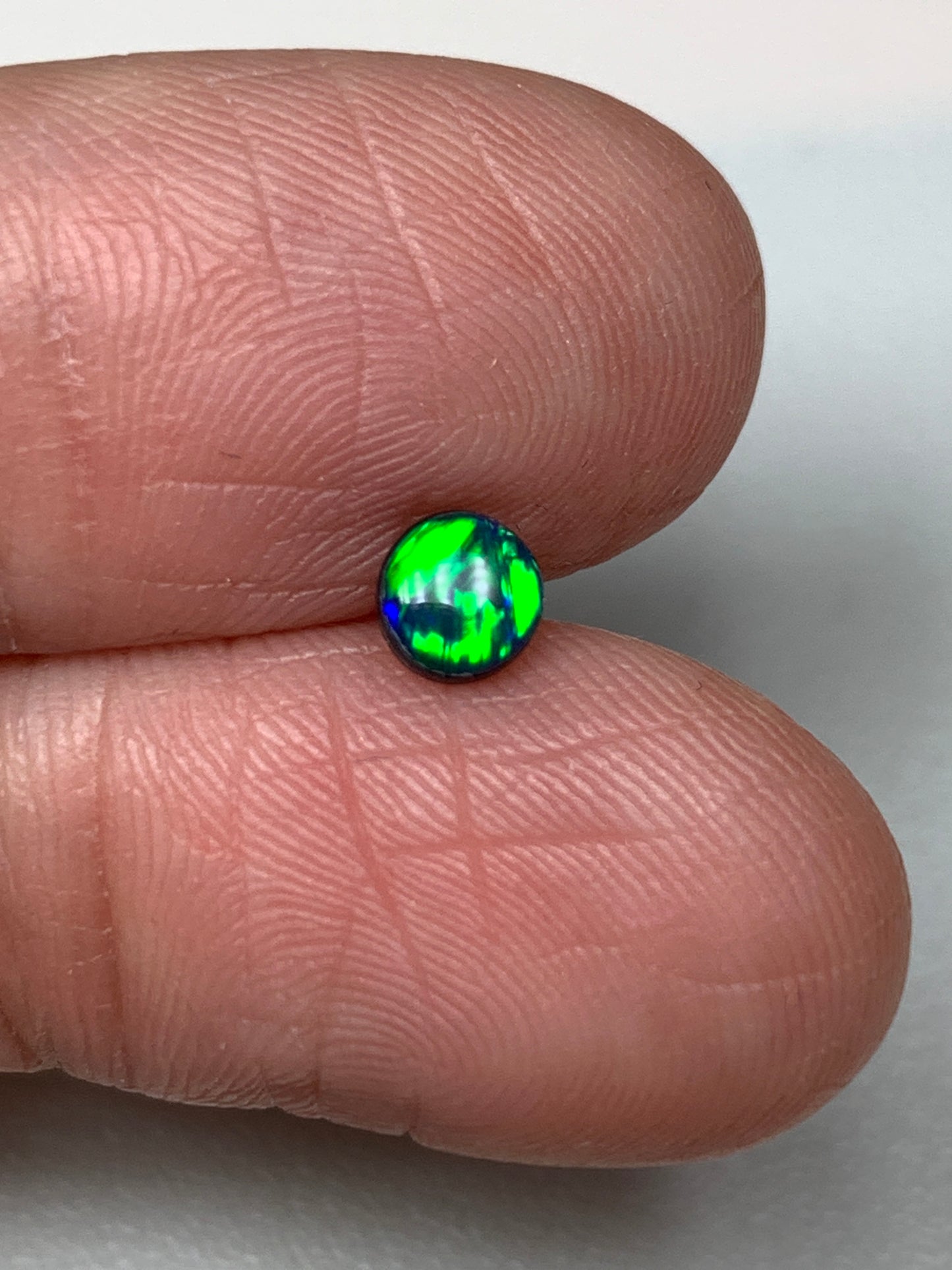 Emerald Light. Lightning Ridge Doublet Black Opal. 0.27 Ct