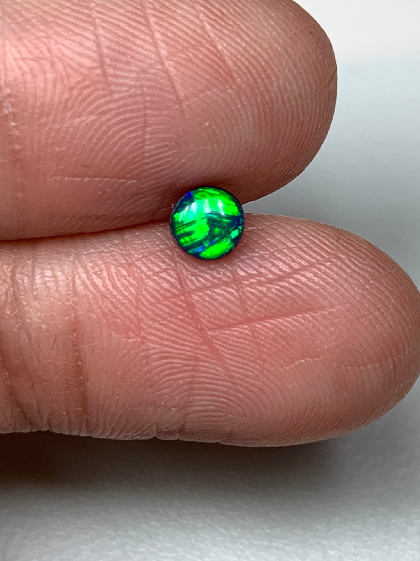 Emerald Light. Lightning Ridge Doublet Black Opal. 0.27 Ct