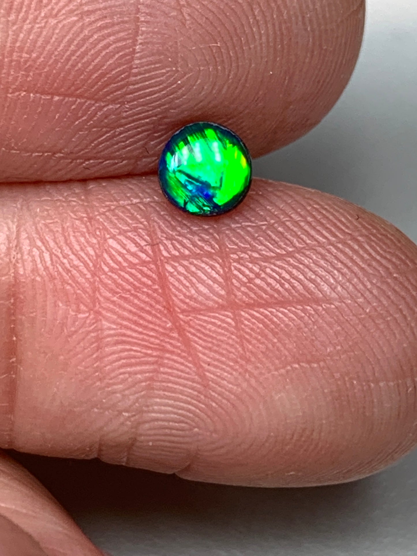 Emerald Light. Lightning Ridge Doublet Black Opal. 0.27 Ct