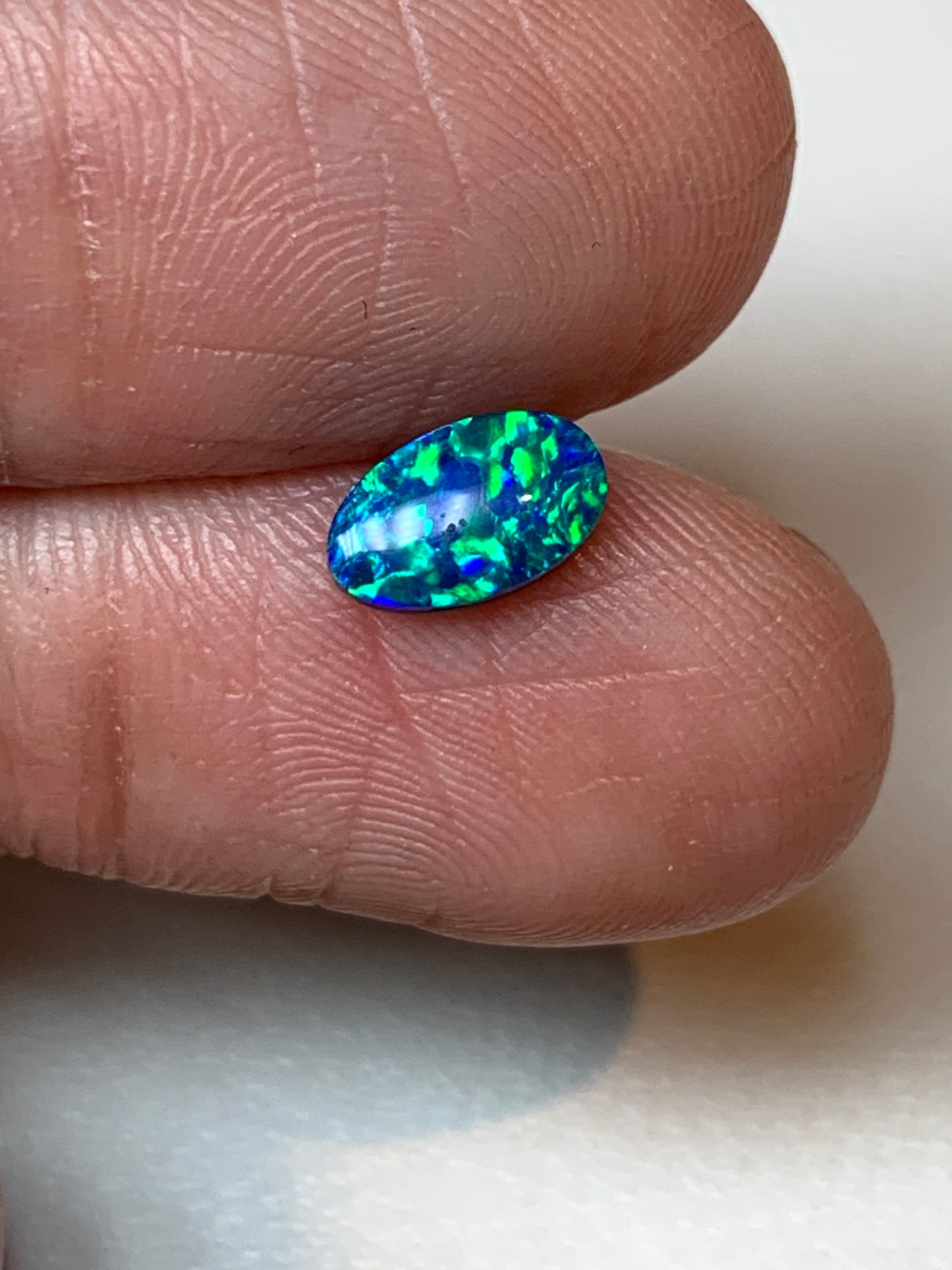Green Spangles. Lightning Ridge Doublet Black Opal. 0.50 Ct
