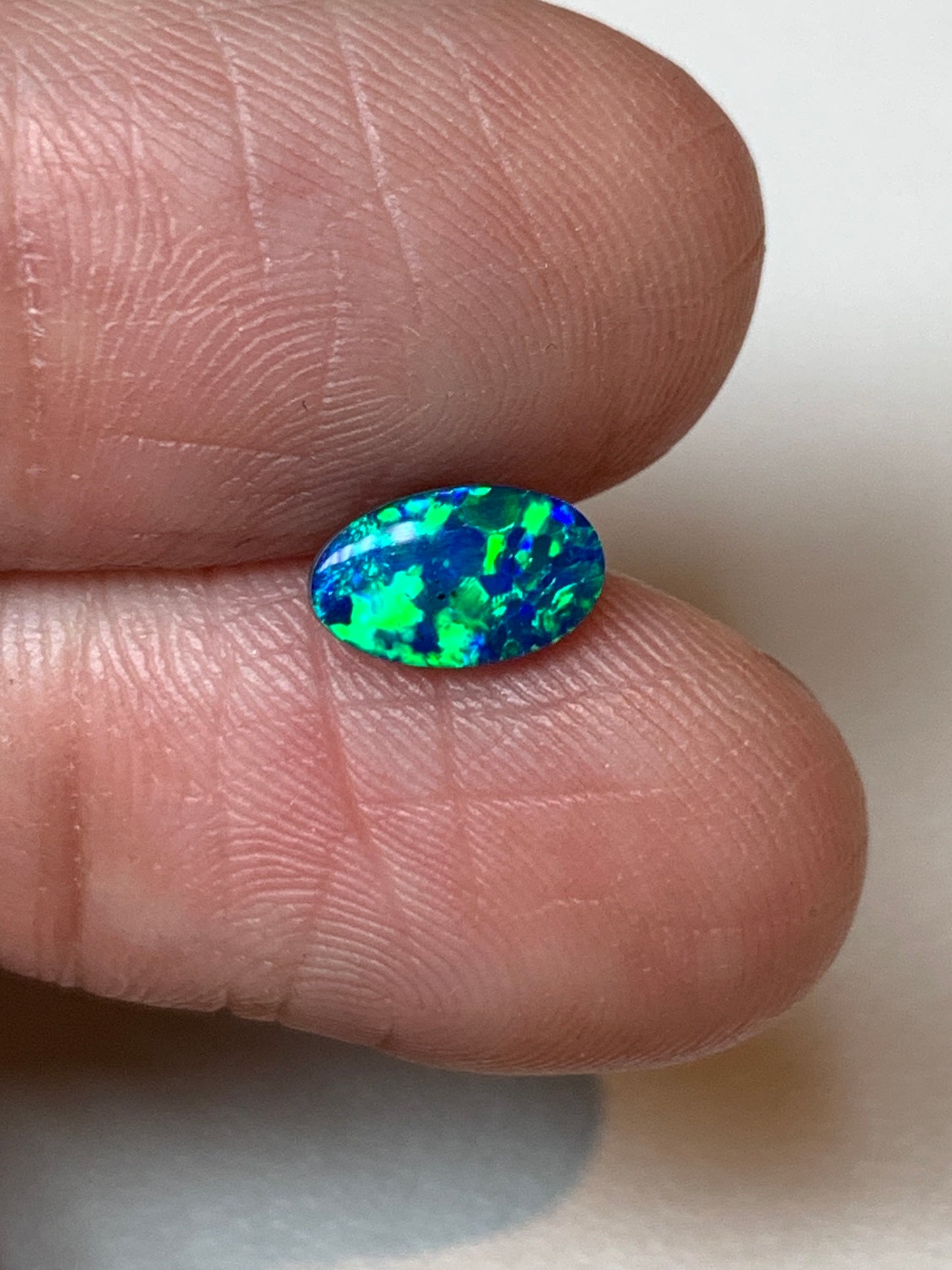 Green Spangles. Lightning Ridge Doublet Black Opal. 0.50 Ct