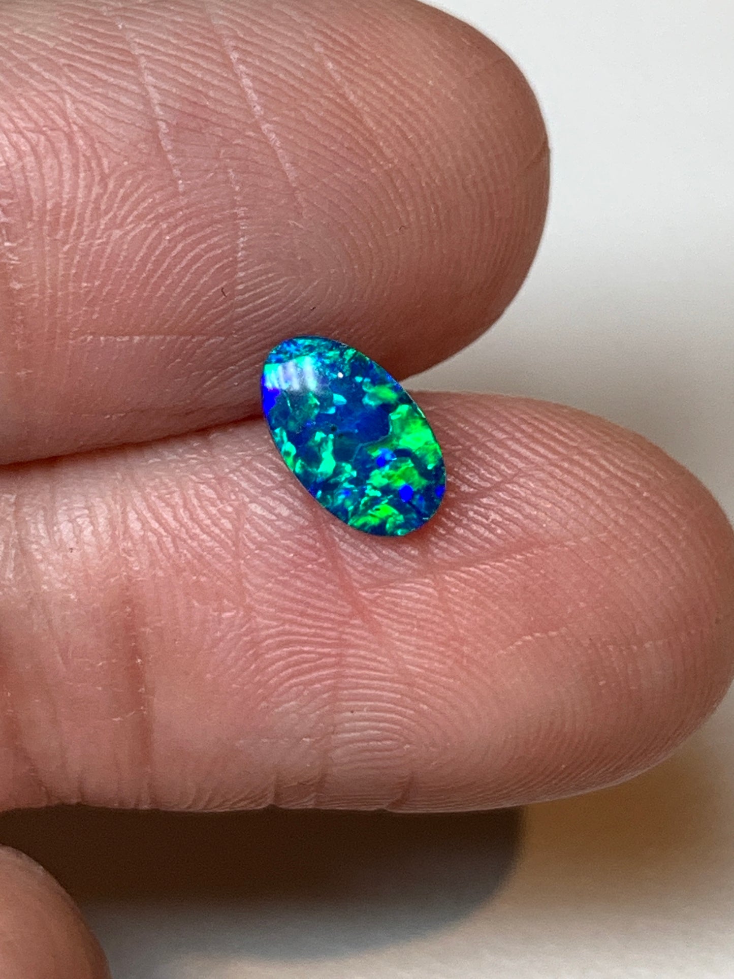 Green Spangles. Lightning Ridge Doublet Black Opal. 0.50 Ct