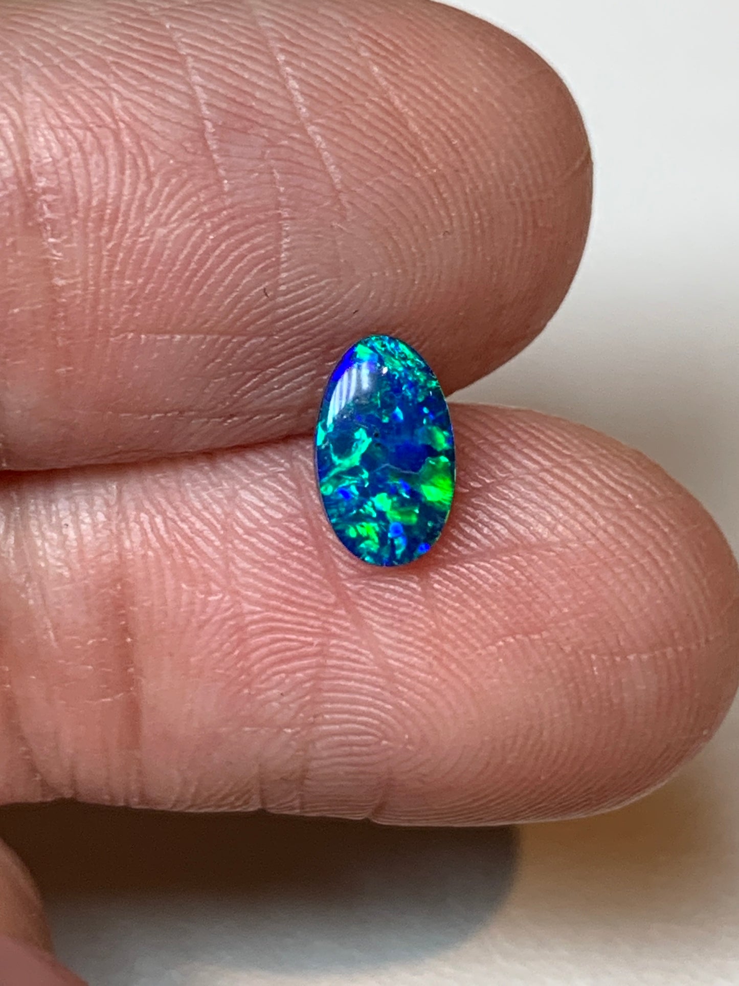 Green Spangles. Lightning Ridge Doublet Black Opal. 0.50 Ct