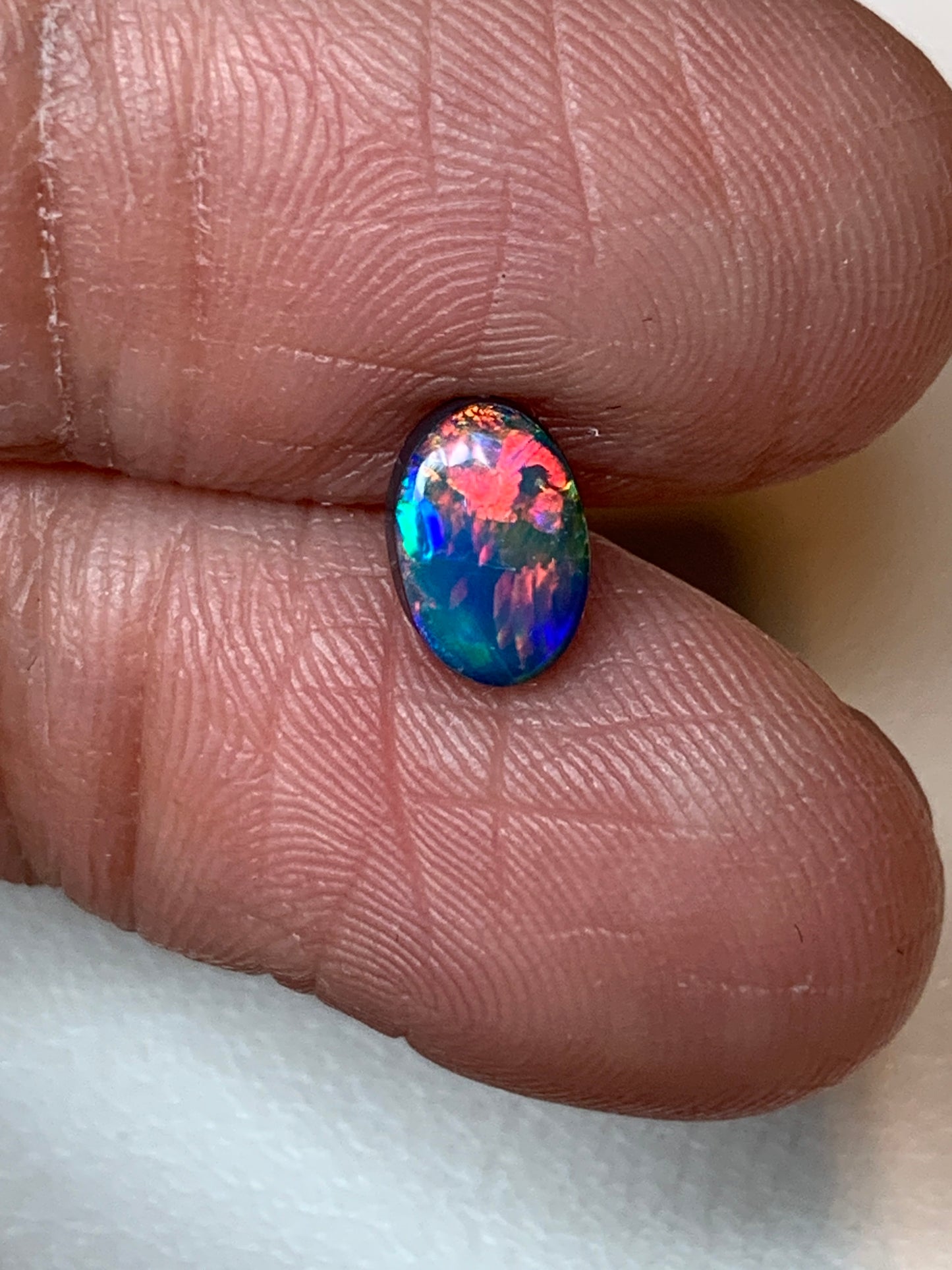 Flower Garden. Lightning Ridge Doublet Black Opal. 0.59 Ct