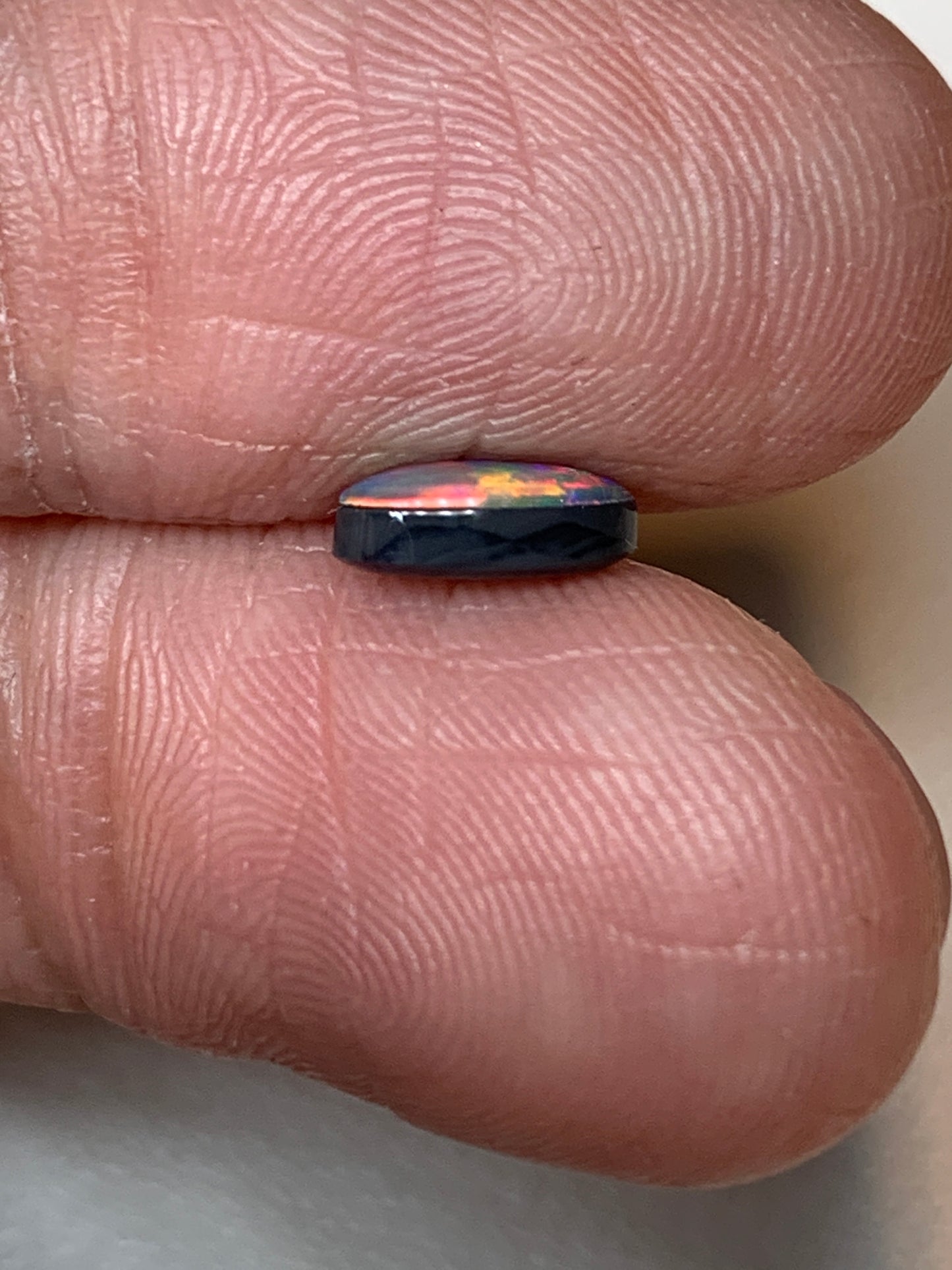 Flower Garden. Lightning Ridge Doublet Black Opal. 0.59 Ct