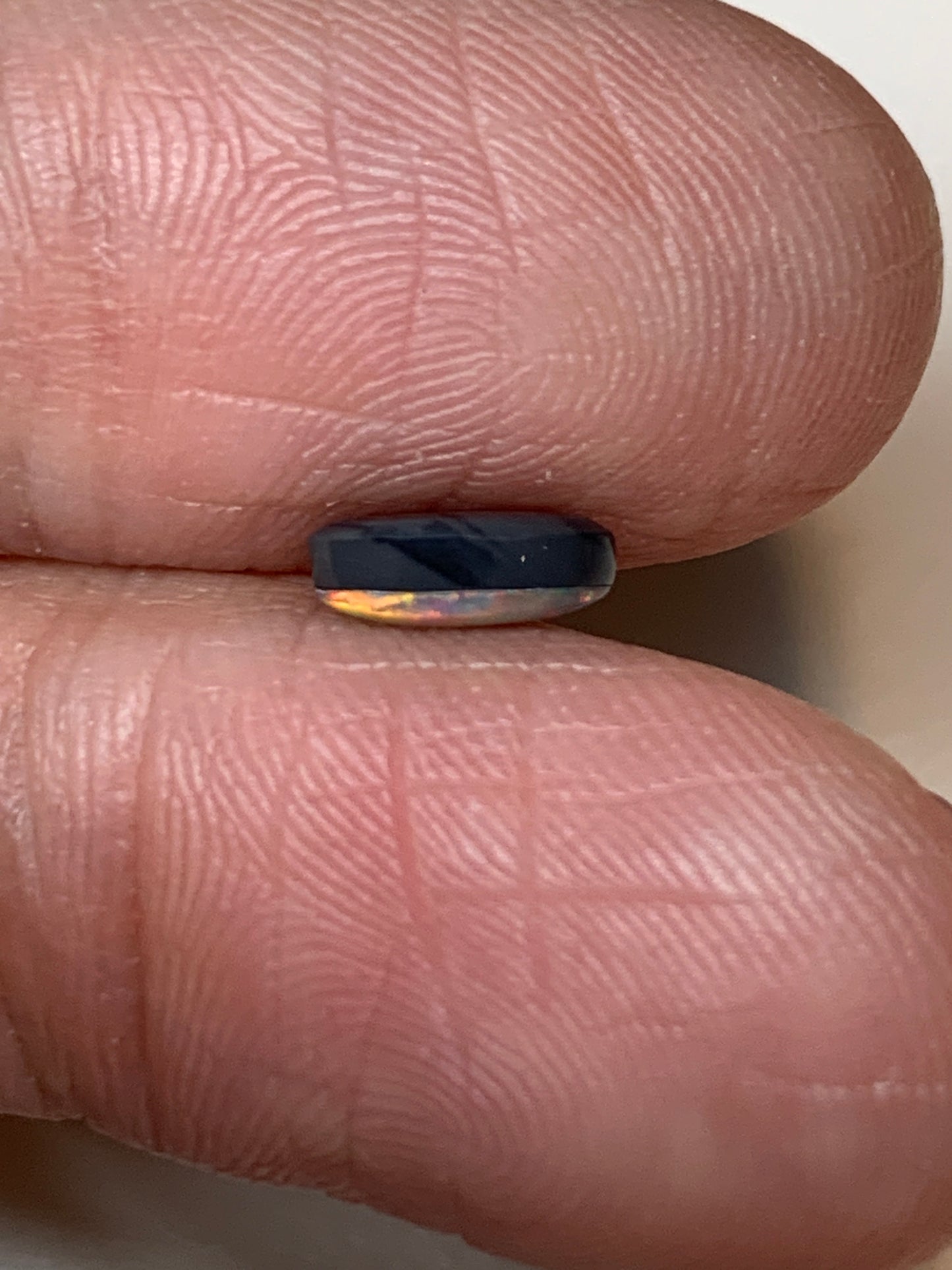 Flower Garden. Lightning Ridge Doublet Black Opal. 0.59 Ct
