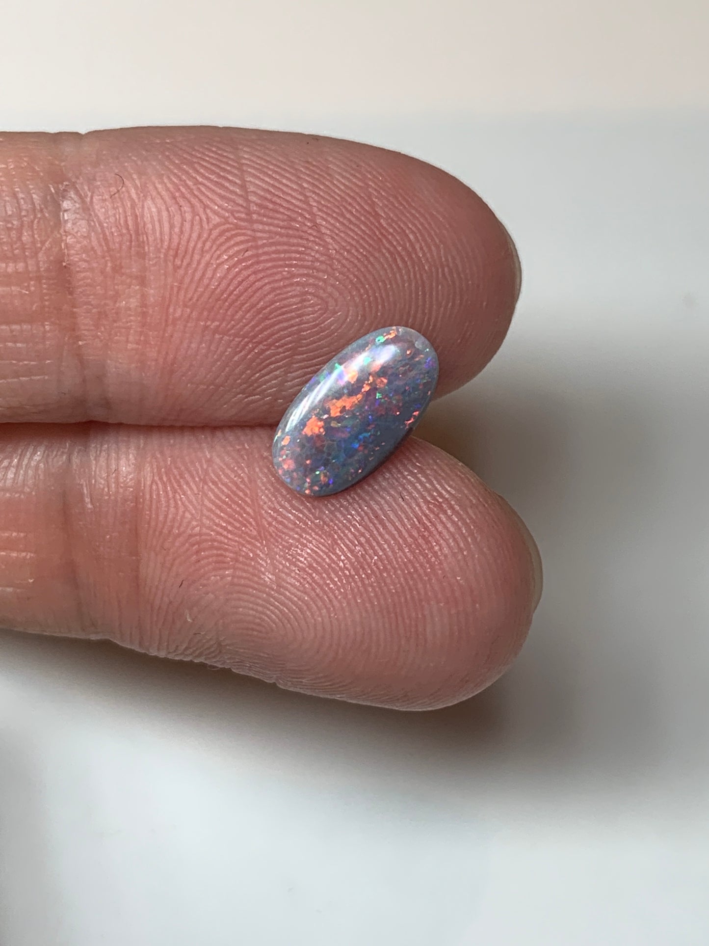 Red Stars. Lightning Ridge Semi- Black Opal. 0.67 Ct