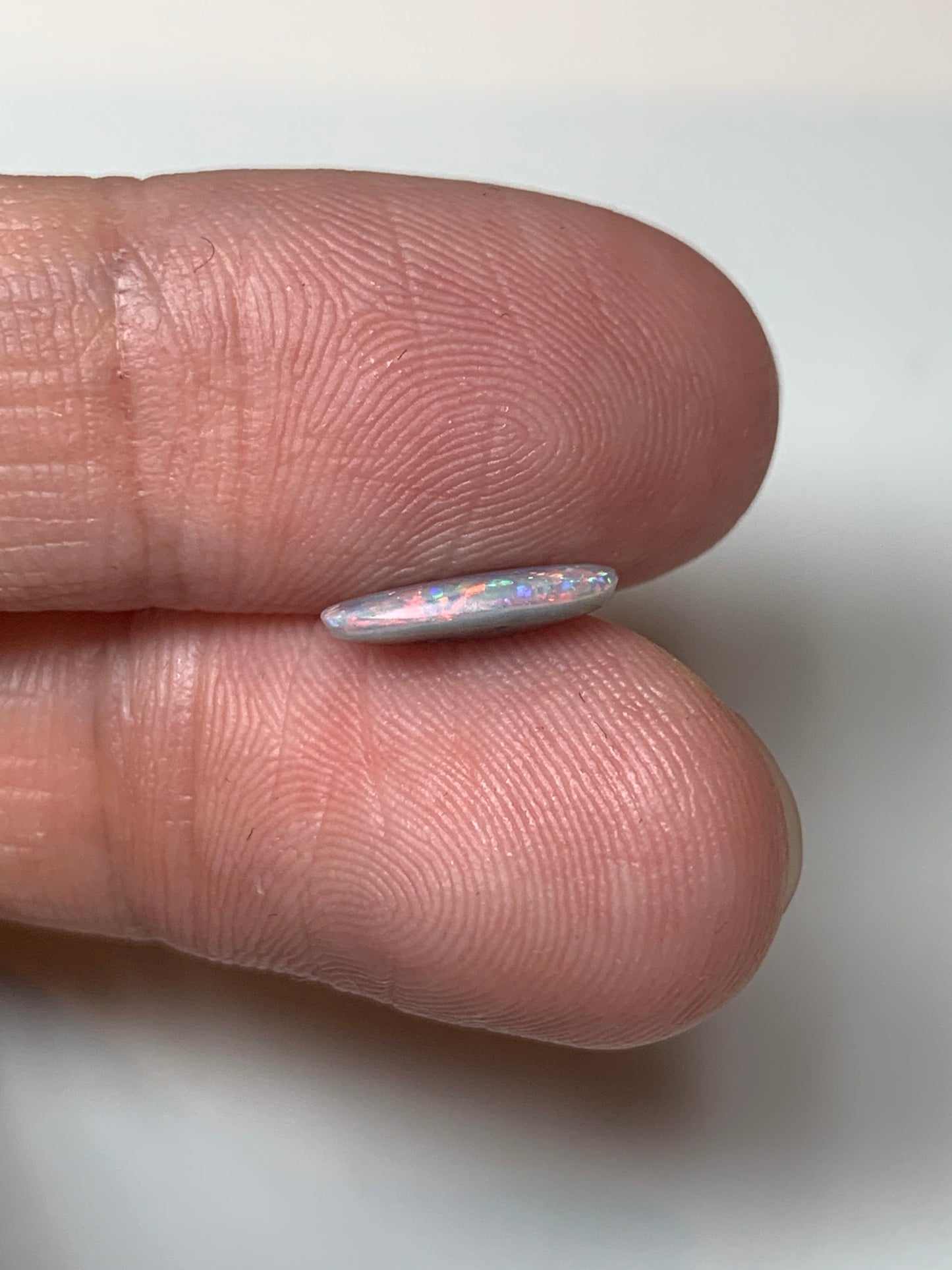 Red Stars. Lightning Ridge Semi- Black Opal. 0.67 Ct