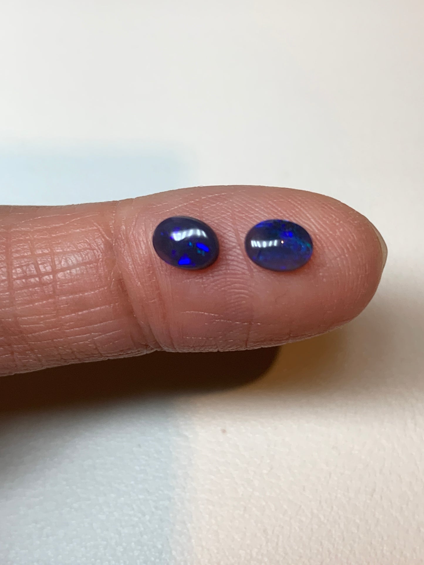 Petite Purple. Lightning Ridge Black Opal Pair. 0.75 Ct