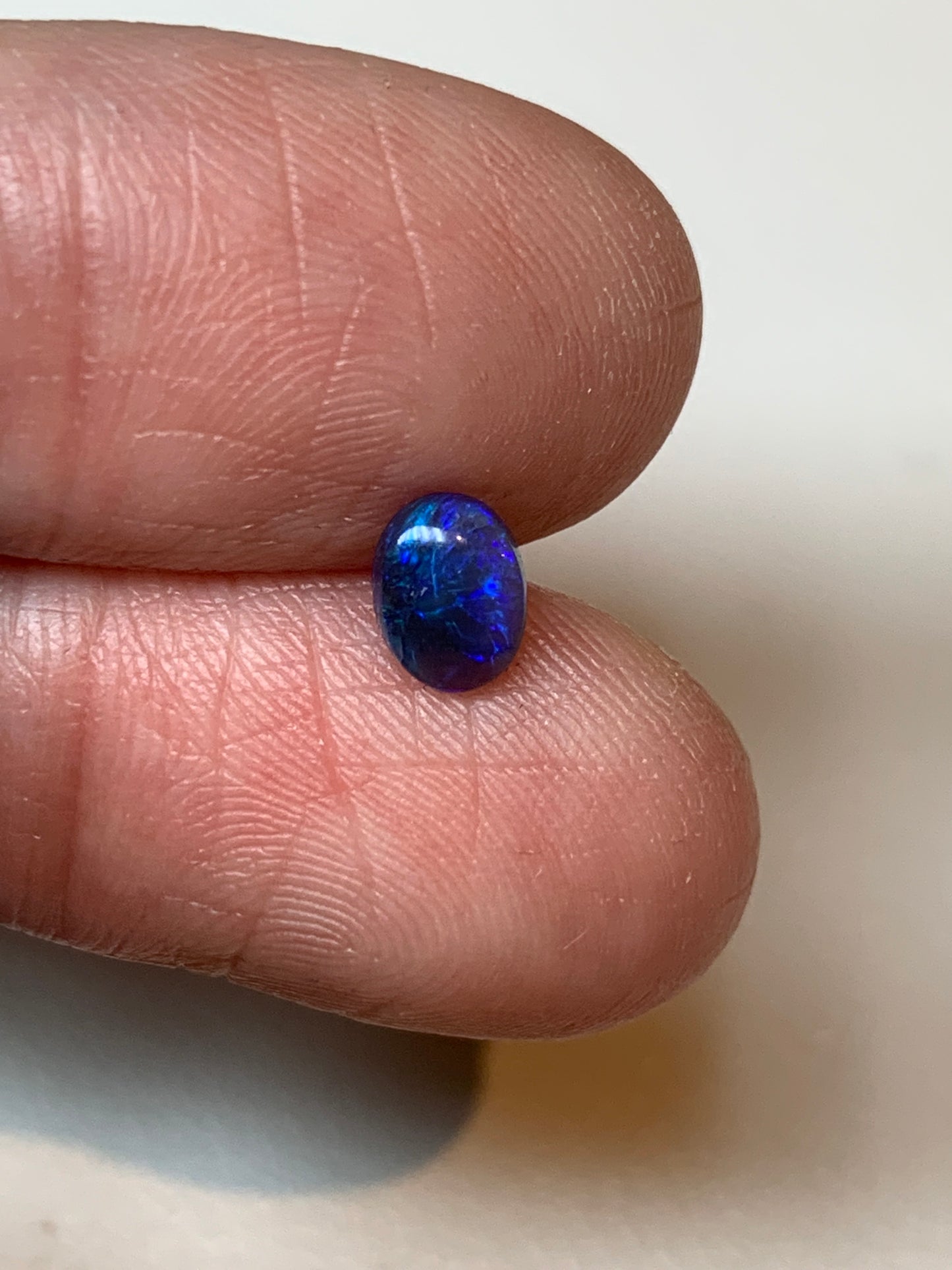 Petite Purple. Lightning Ridge Black Opal Pair. 0.75 Ct