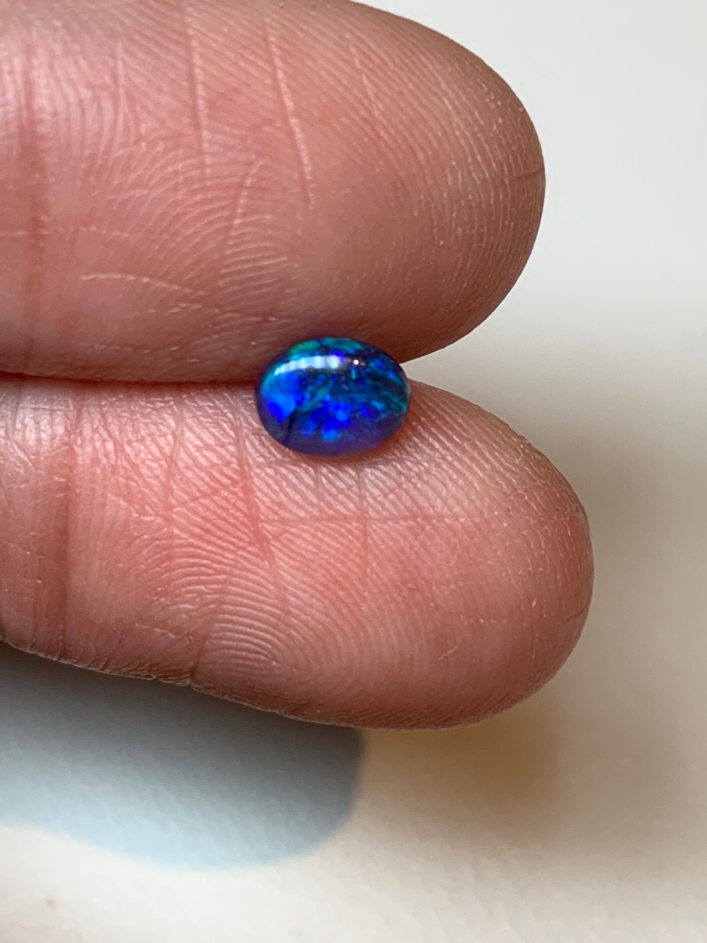 Petite Purple. Lightning Ridge Black Opal Pair. 0.75 Ct