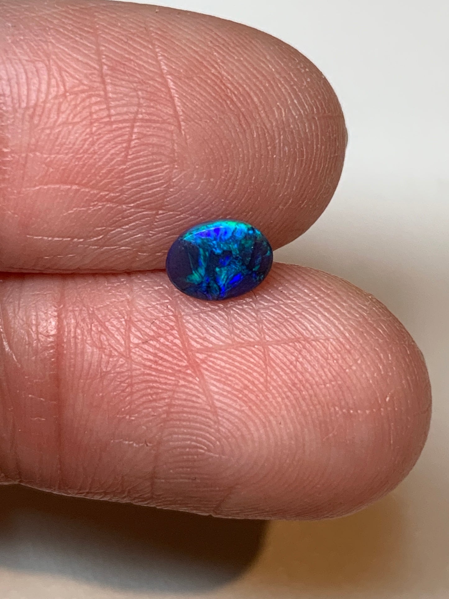 Petite Purple. Lightning Ridge Black Opal Pair. 0.75 Ct
