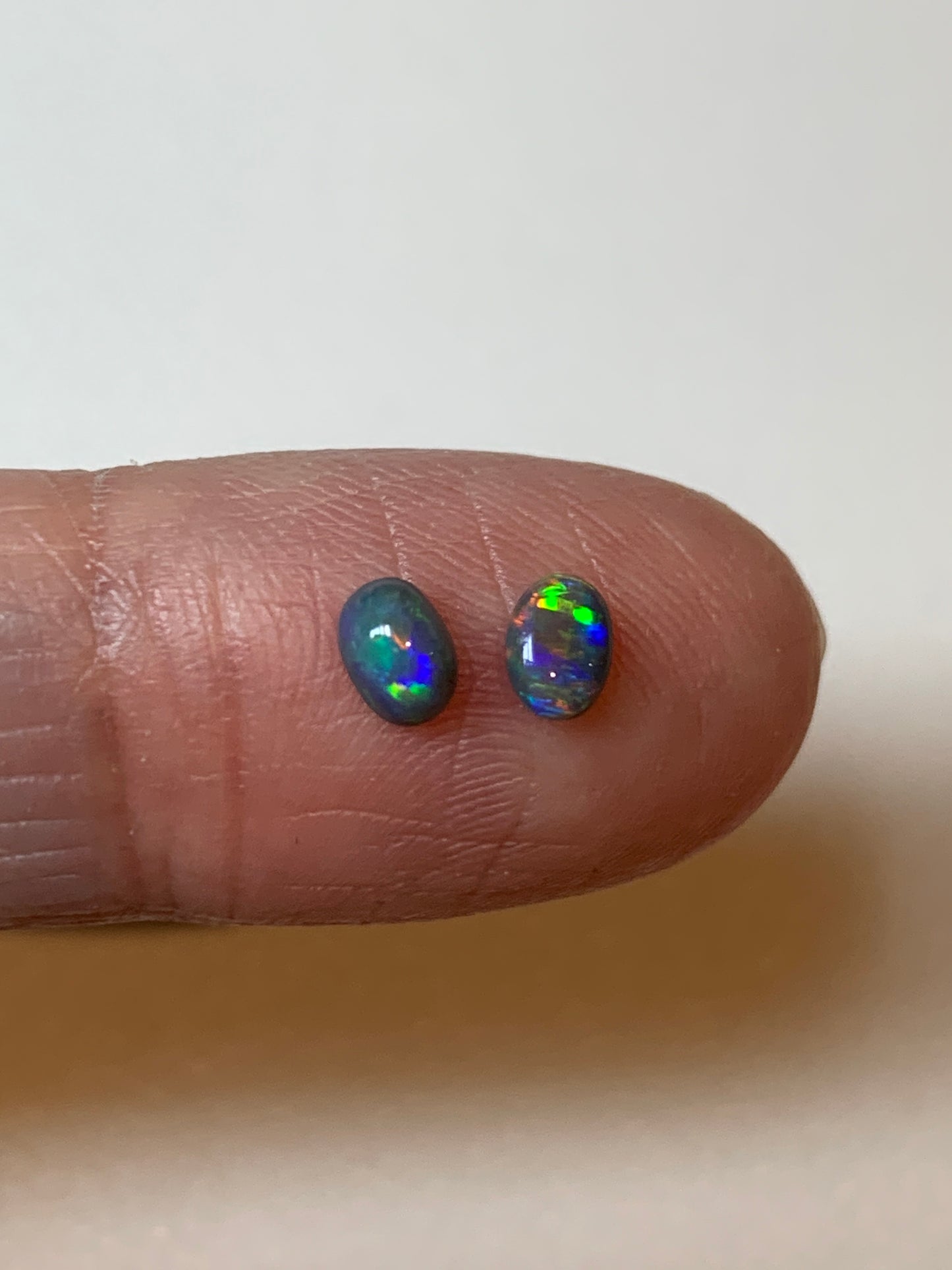 Sesame Surprise. Lightning Ridge Black Opal Pair. 0.37 Ct