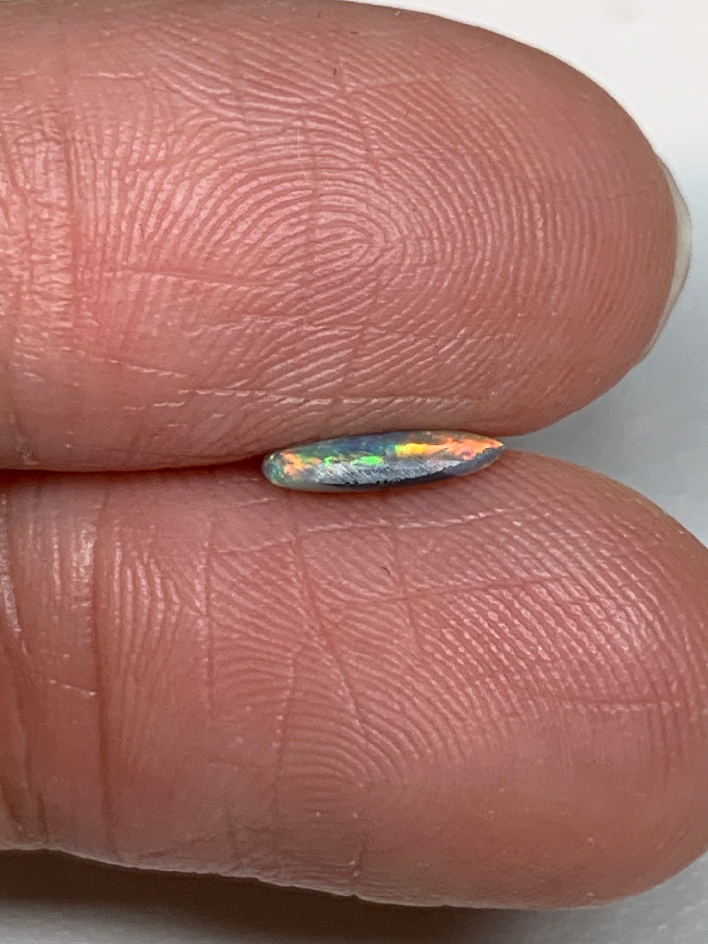 Extra Brilliant. Lightning Ridge Solid Opal. 0.38 Ct