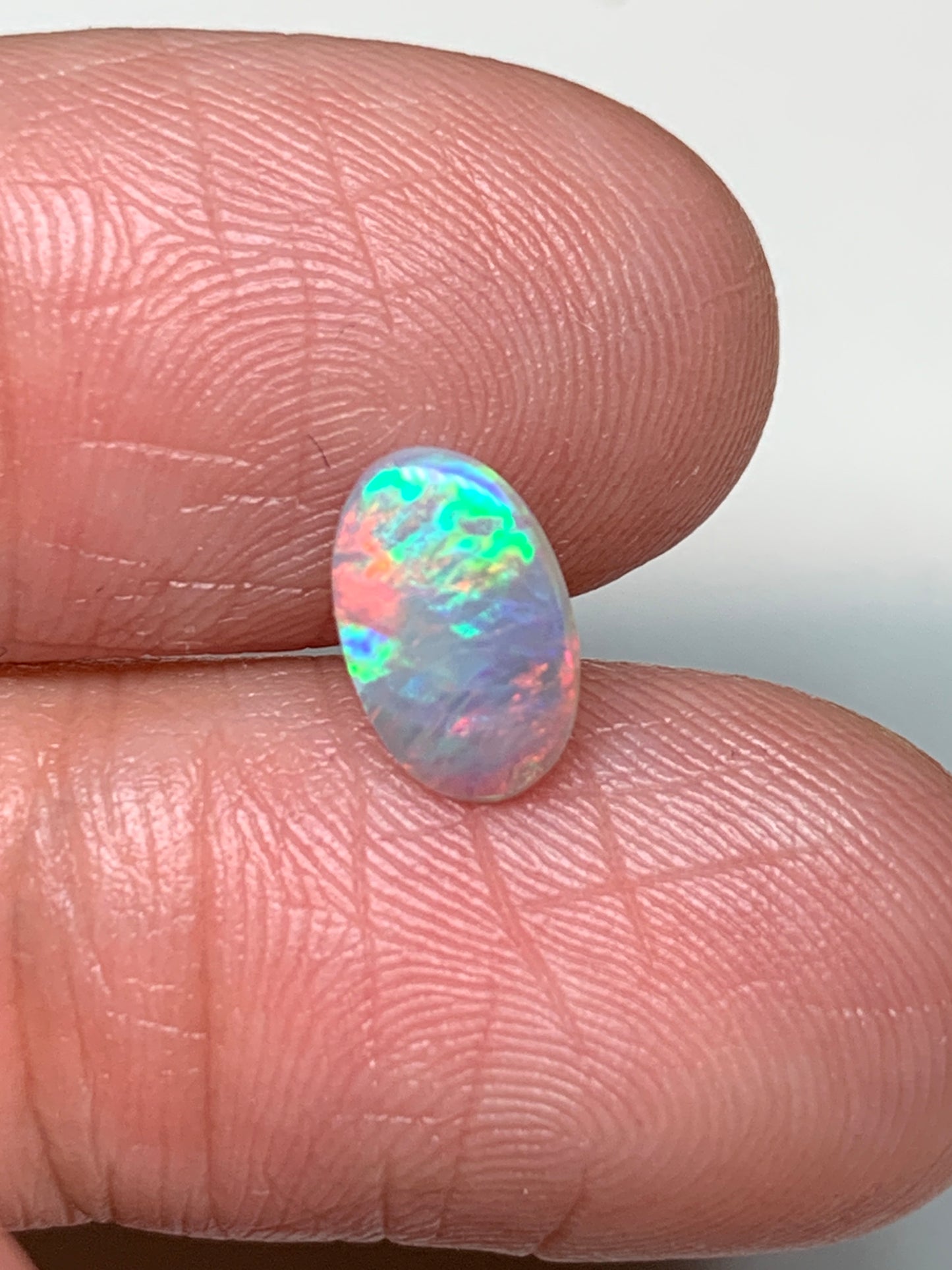 Pretty Flamingo. Lightning Ridge Solid Opal. 0.64 Ct