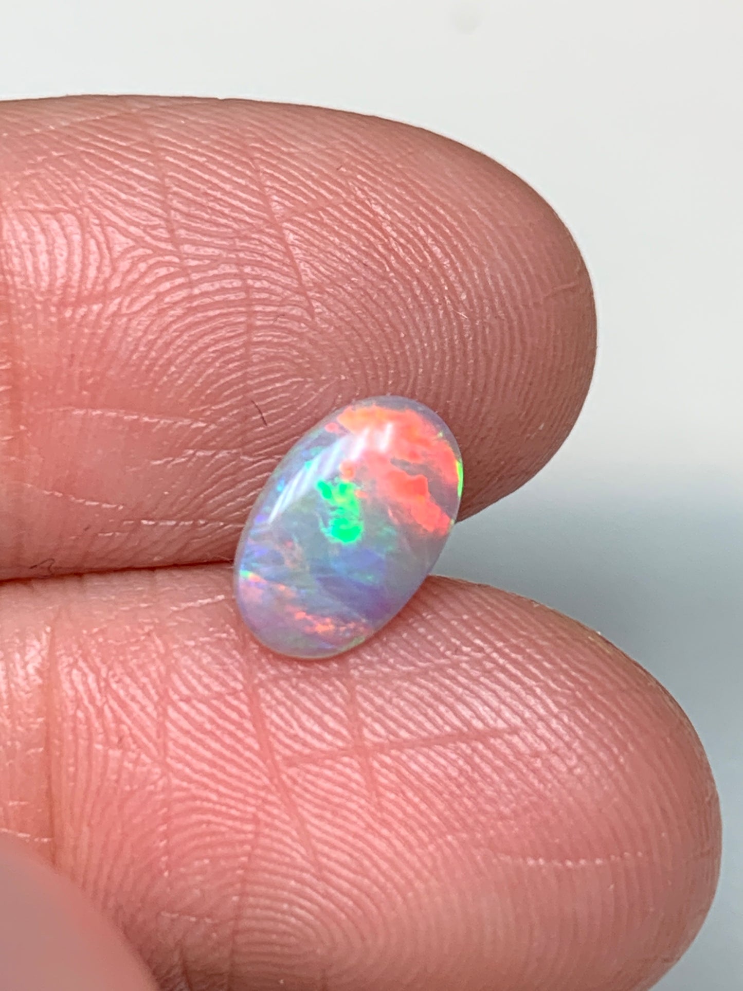 Pretty Flamingo. Lightning Ridge Solid Opal. 0.64 Ct