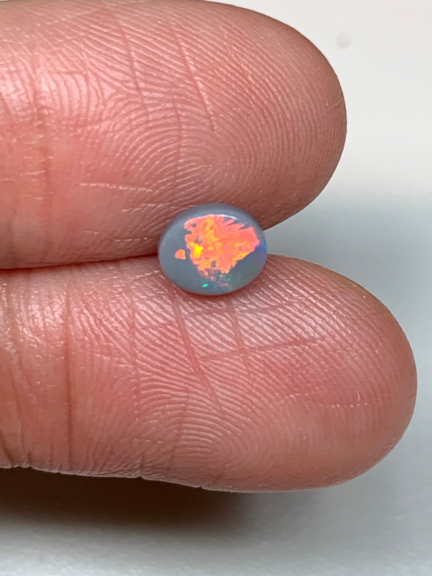 Sunrise Flashes. Lightning Ridge Solid Opal. 0.6 Ct