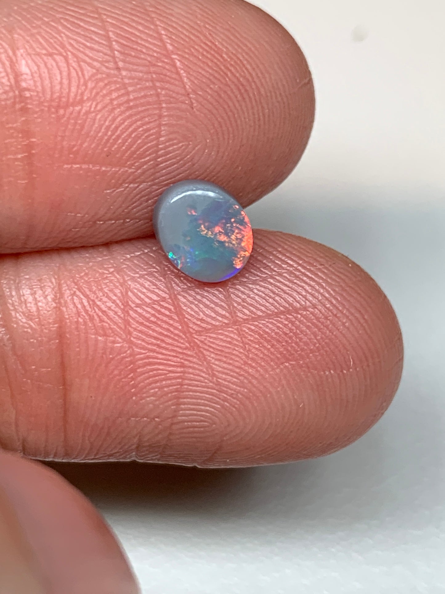 Sunrise Flashes. Lightning Ridge Solid Opal. 0.6 Ct
