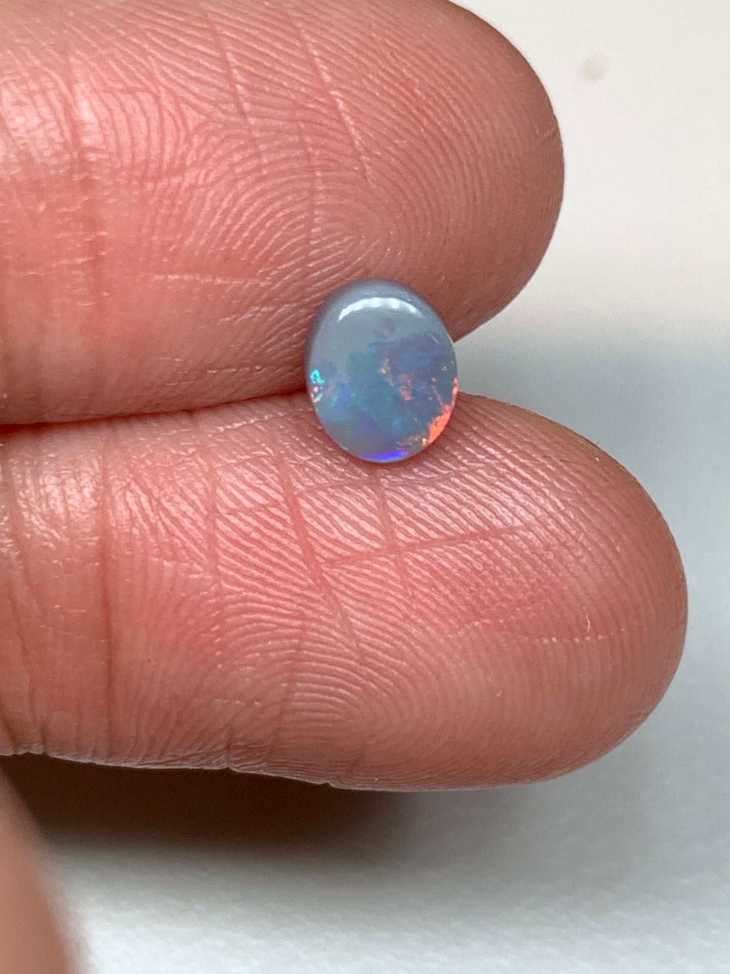 Sunrise Flashes. Lightning Ridge Solid Opal. 0.6 Ct