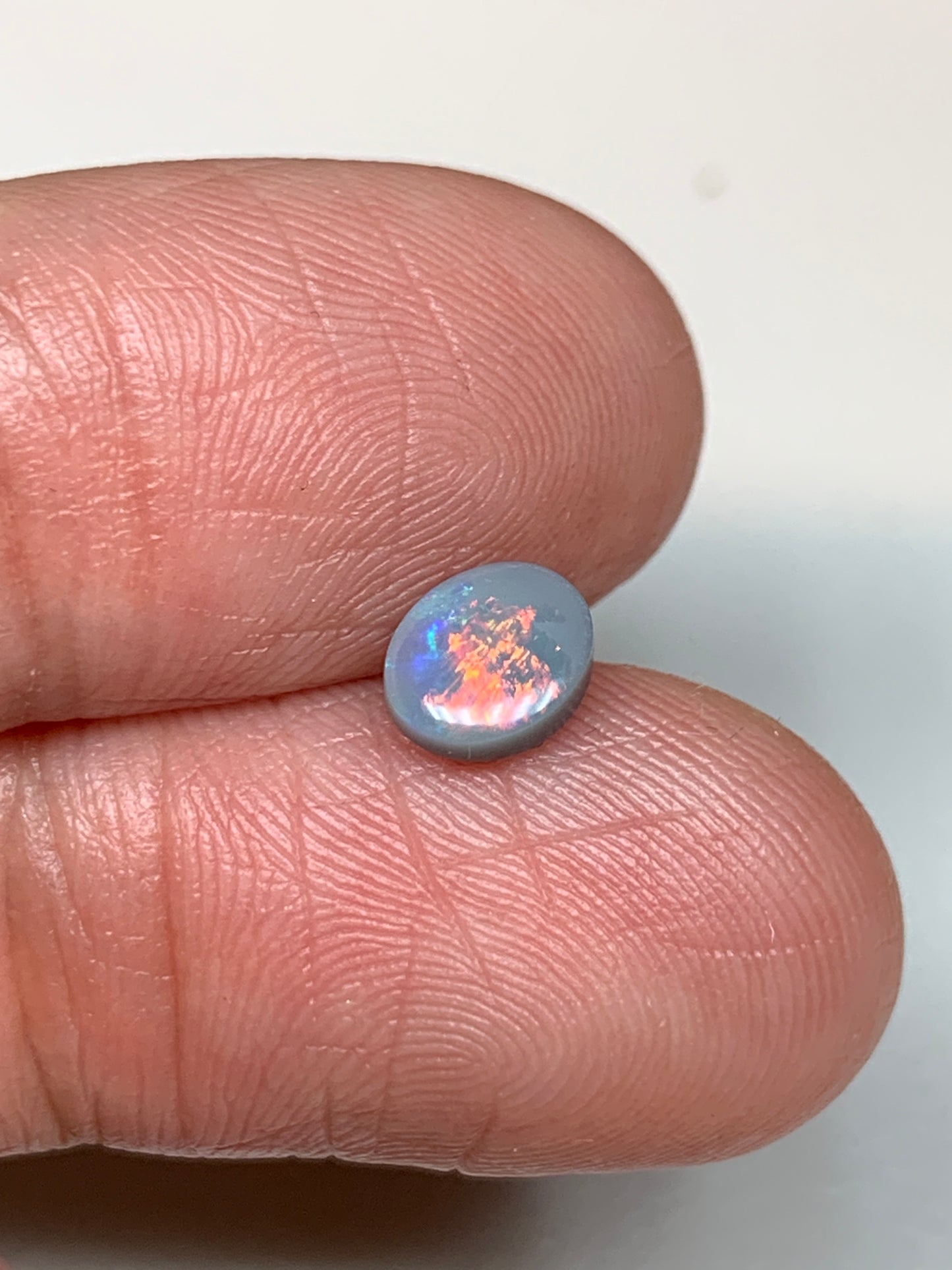 Sunrise Flashes. Lightning Ridge Solid Opal. 0.6 Ct