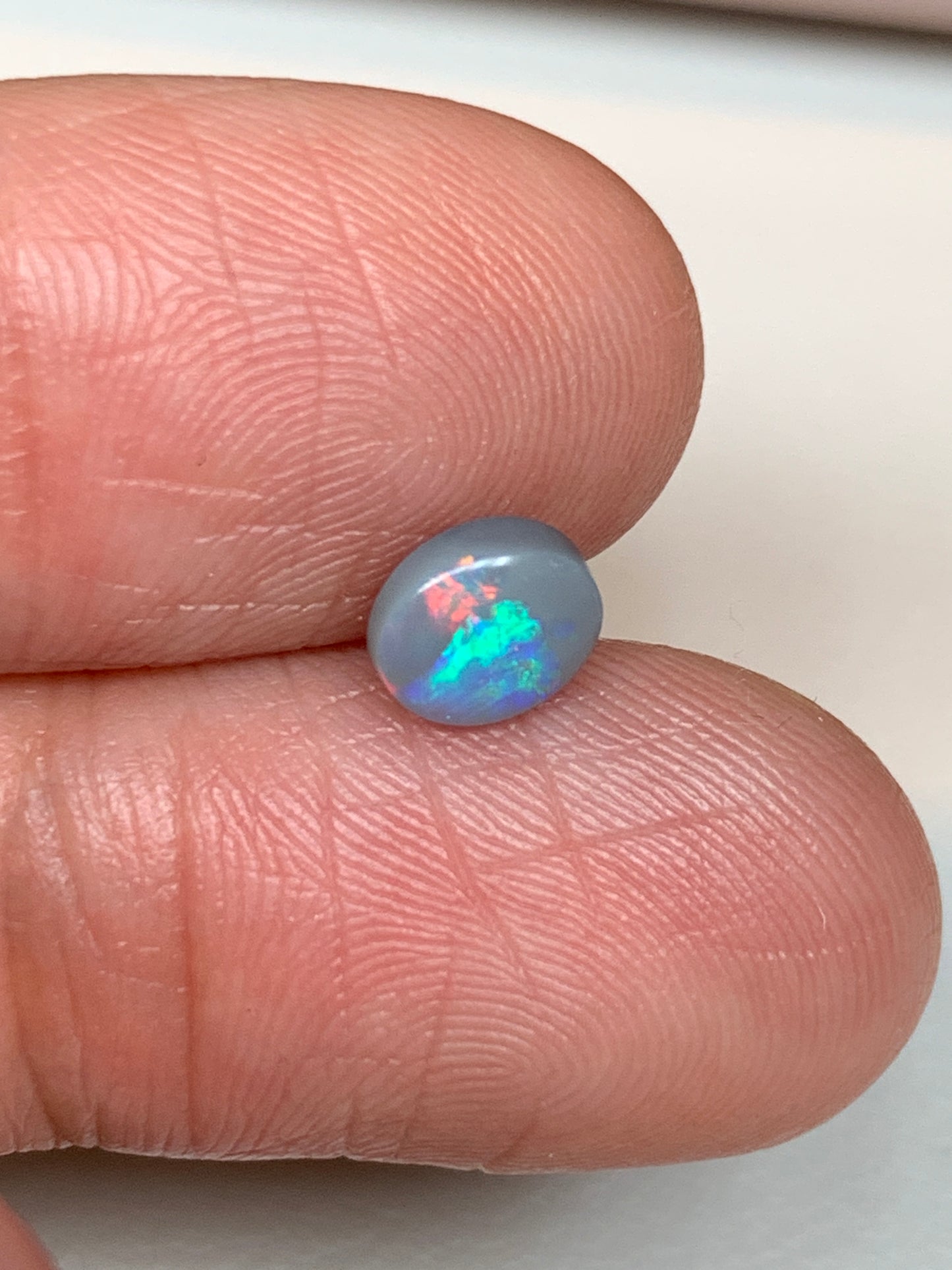 Sunrise Flashes. Lightning Ridge Solid Opal. 0.6 Ct