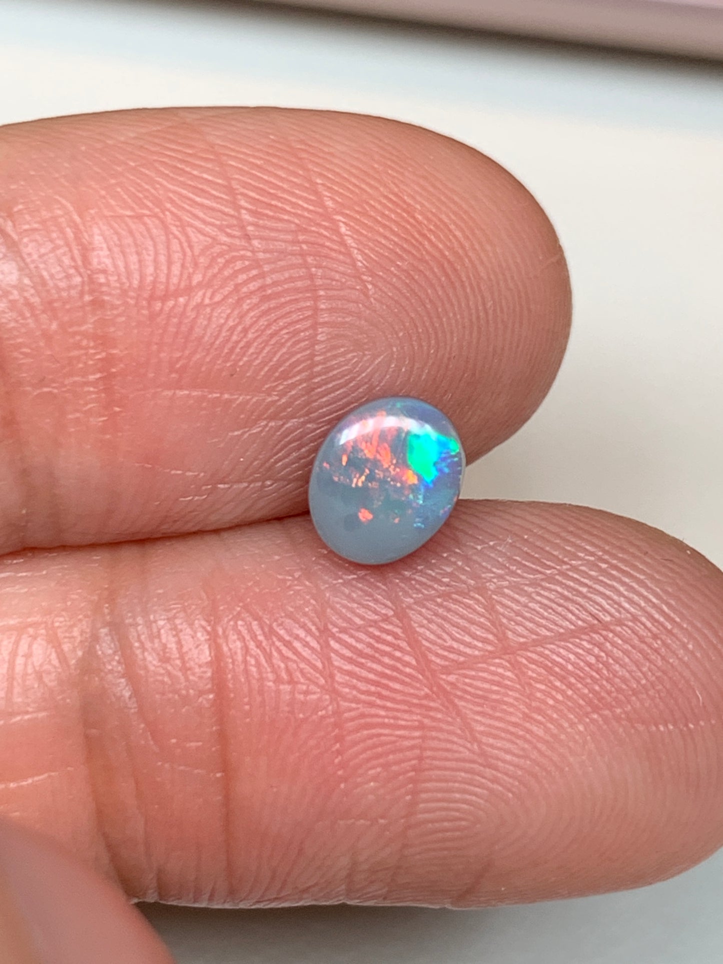 Sunrise Flashes. Lightning Ridge Solid Opal. 0.6 Ct