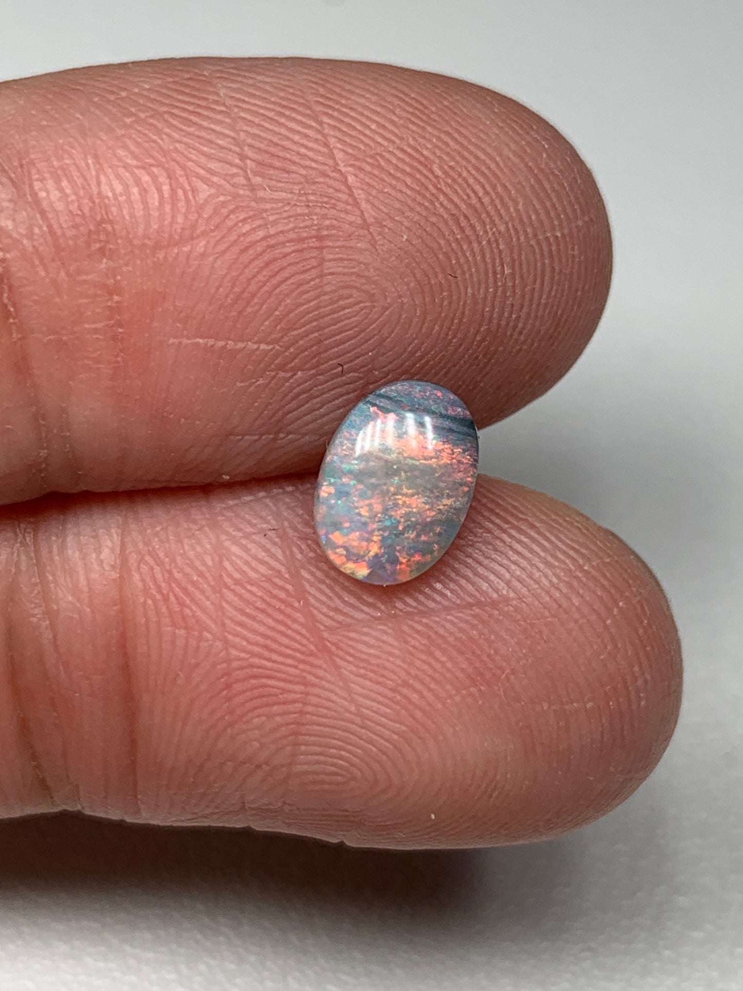 Pink Sky. Lightning Ridge Solid Black Crystal Opal. 0.72 Ct