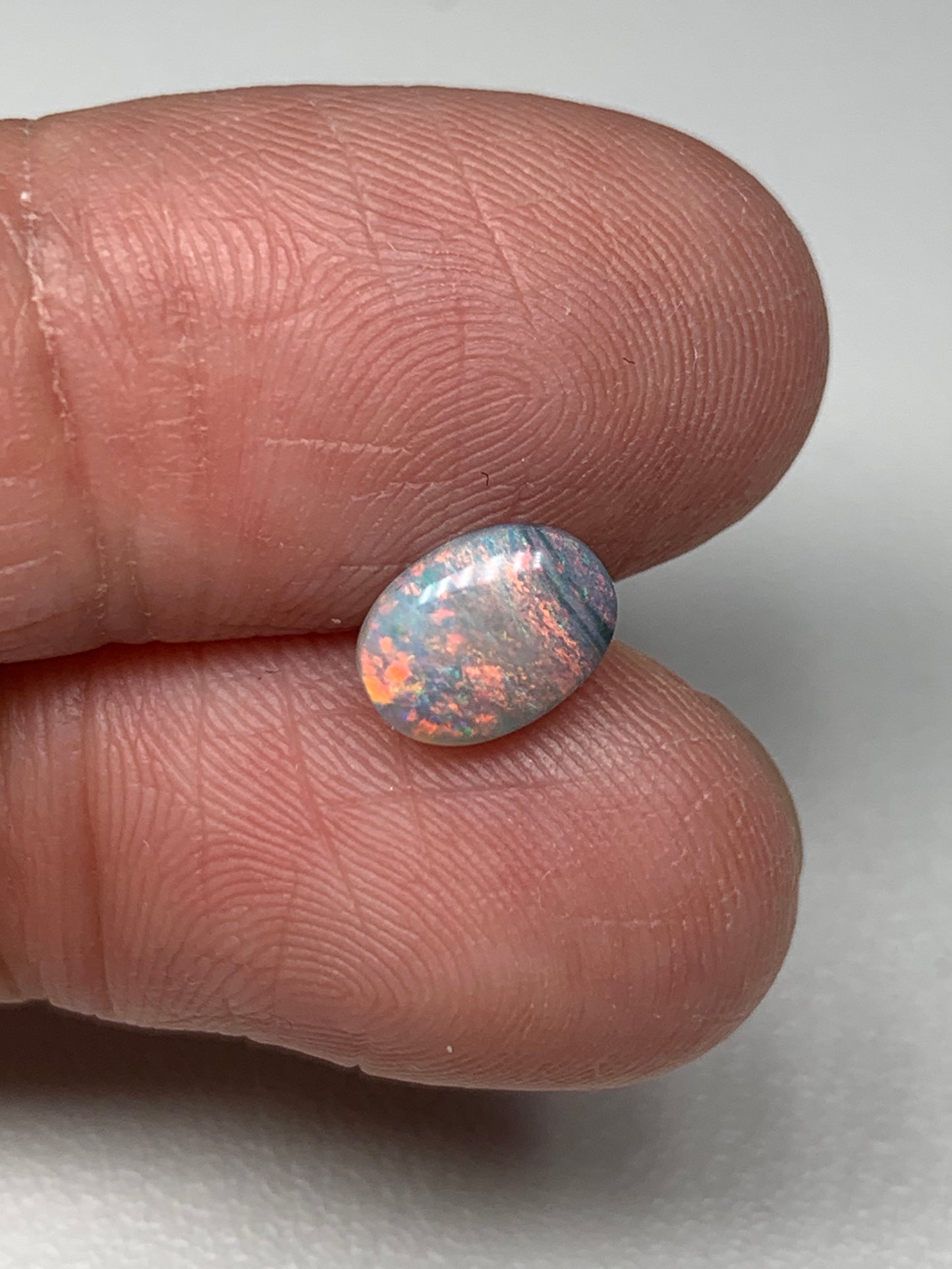 Pink Sky. Lightning Ridge Solid Black Crystal Opal. 0.72 Ct