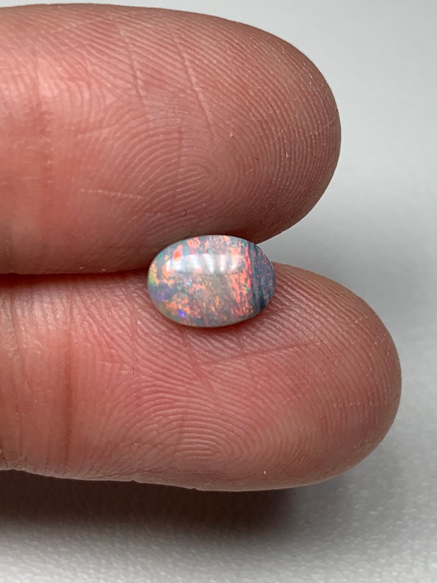 Pink Sky. Lightning Ridge Solid Black Crystal Opal. 0.72 Ct