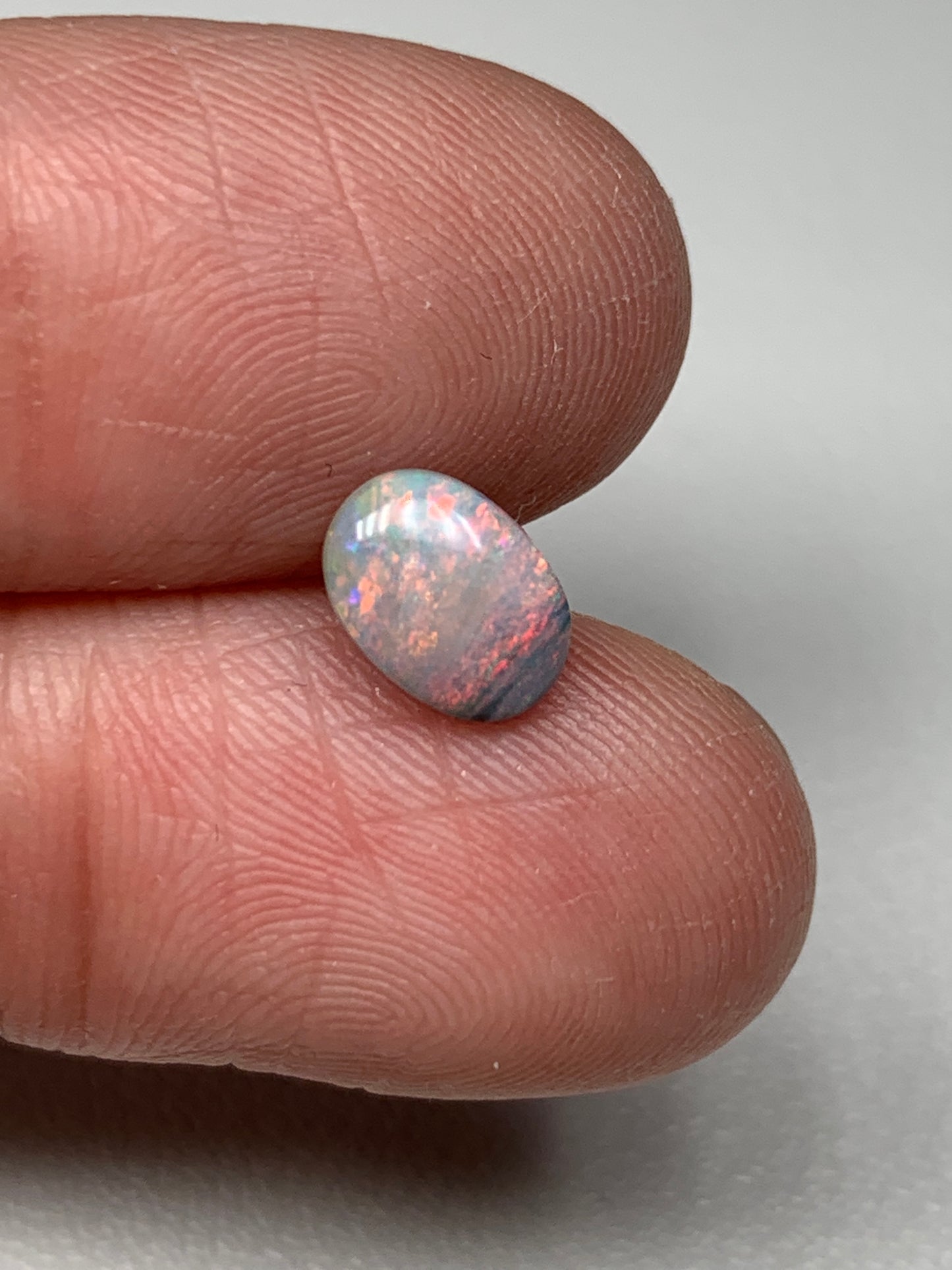 Pink Sky. Lightning Ridge Solid Black Crystal Opal. 0.72 Ct