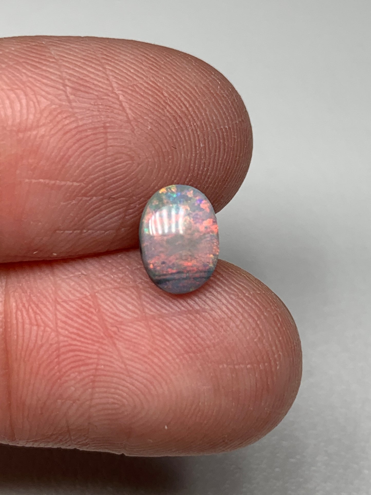 Pink Sky. Lightning Ridge Solid Black Crystal Opal. 0.72 Ct