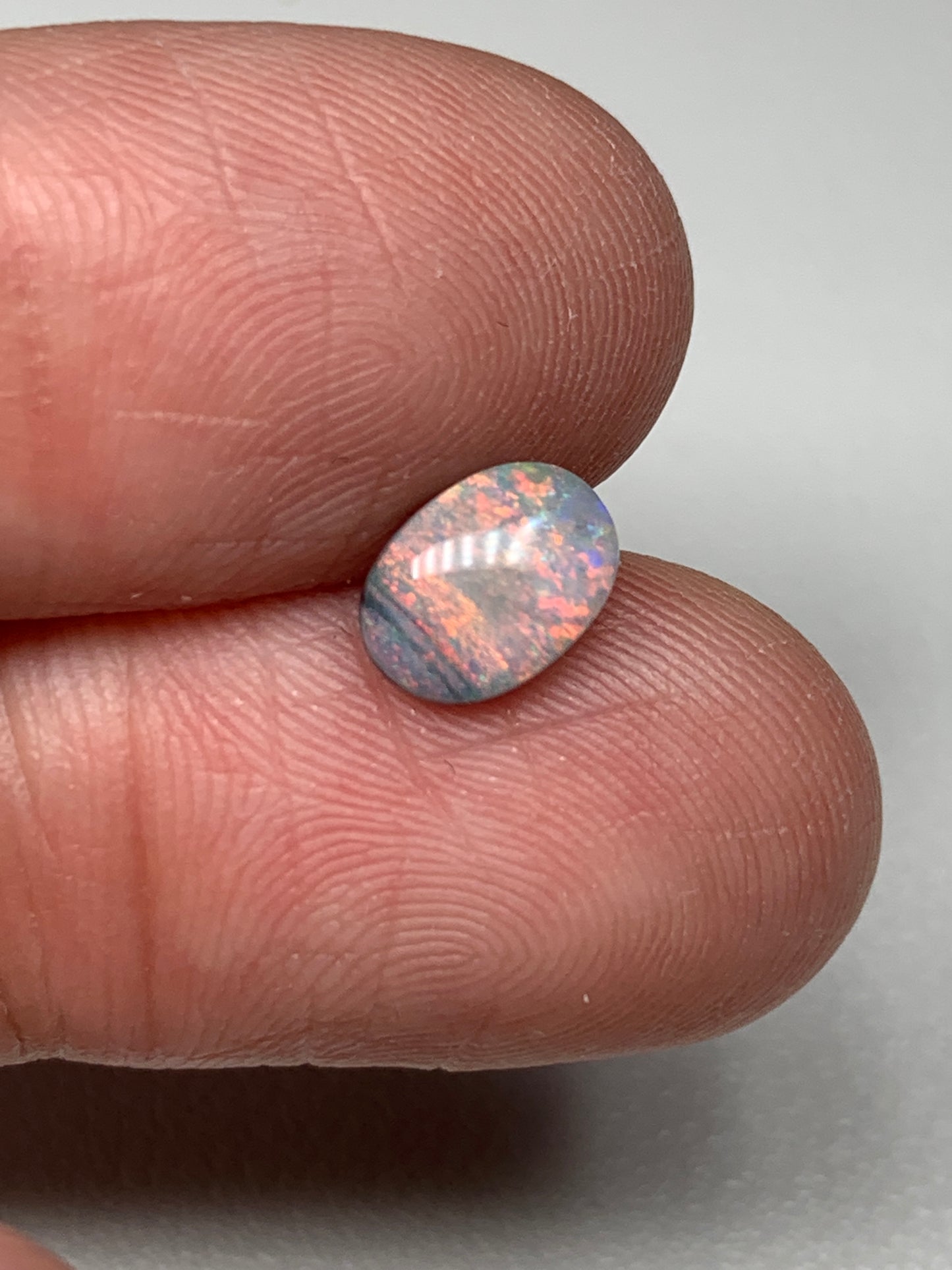 Pink Sky. Lightning Ridge Solid Black Crystal Opal. 0.72 Ct
