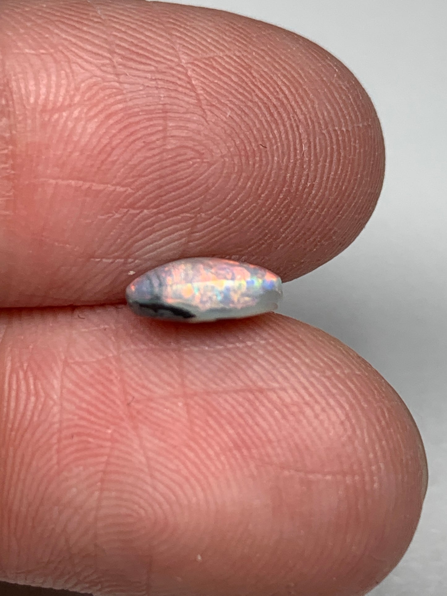 Pink Sky. Lightning Ridge Solid Black Crystal Opal. 0.72 Ct