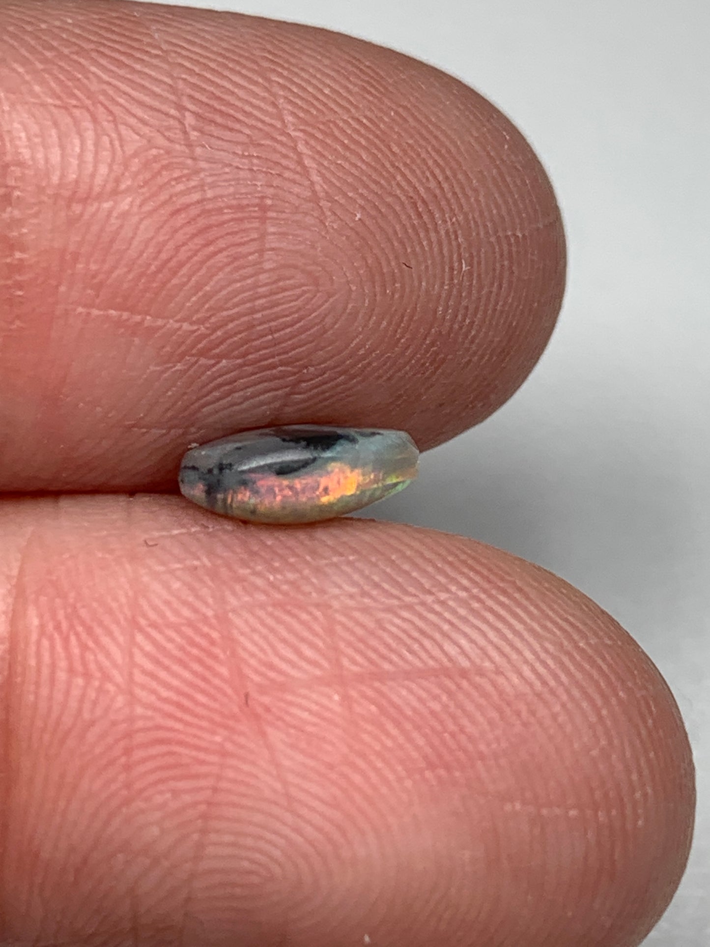 Pink Sky. Lightning Ridge Solid Black Crystal Opal. 0.72 Ct