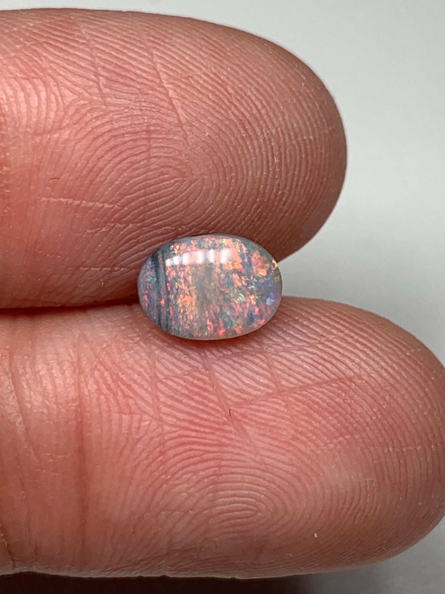 Pink Sky. Lightning Ridge Solid Black Crystal Opal. 0.72 Ct