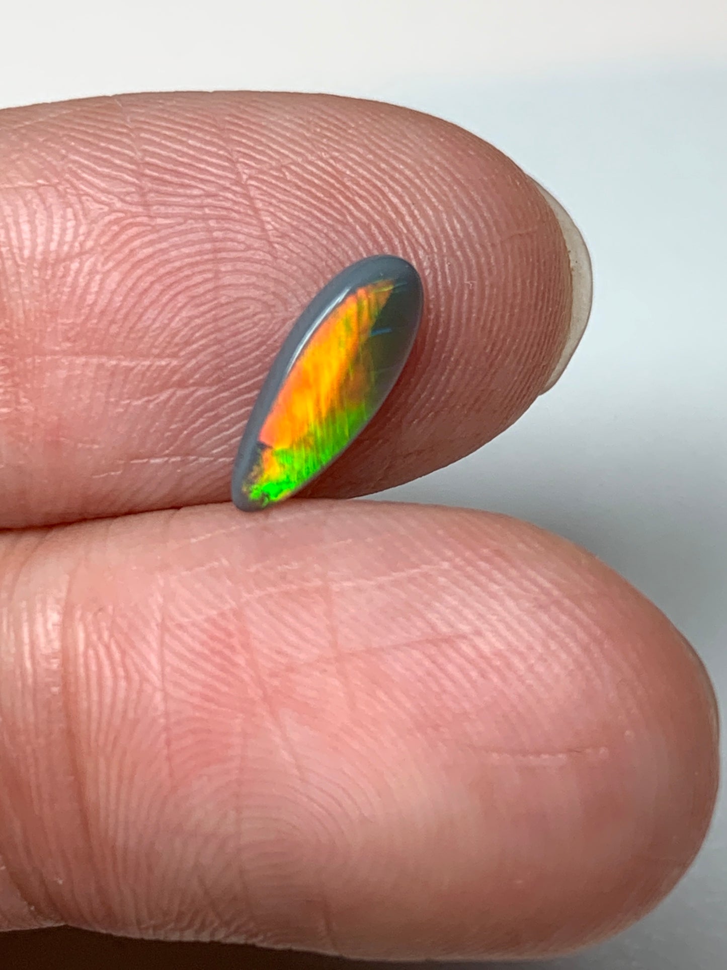 Electric Flashes. Lightning Ridge Black Opal. 0.43 Ct