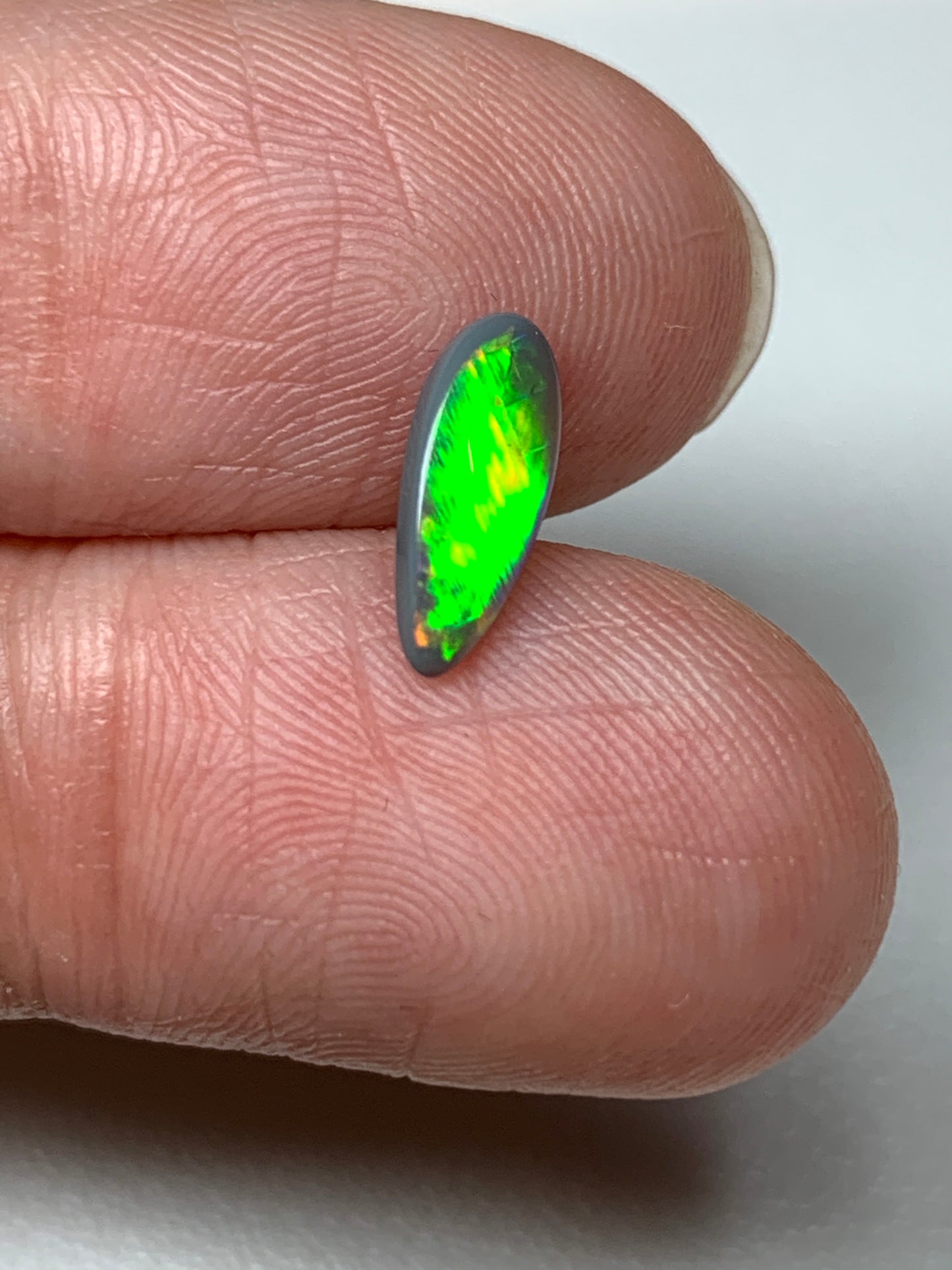 Electric Flashes. Lightning Ridge Black Opal. 0.43 Ct