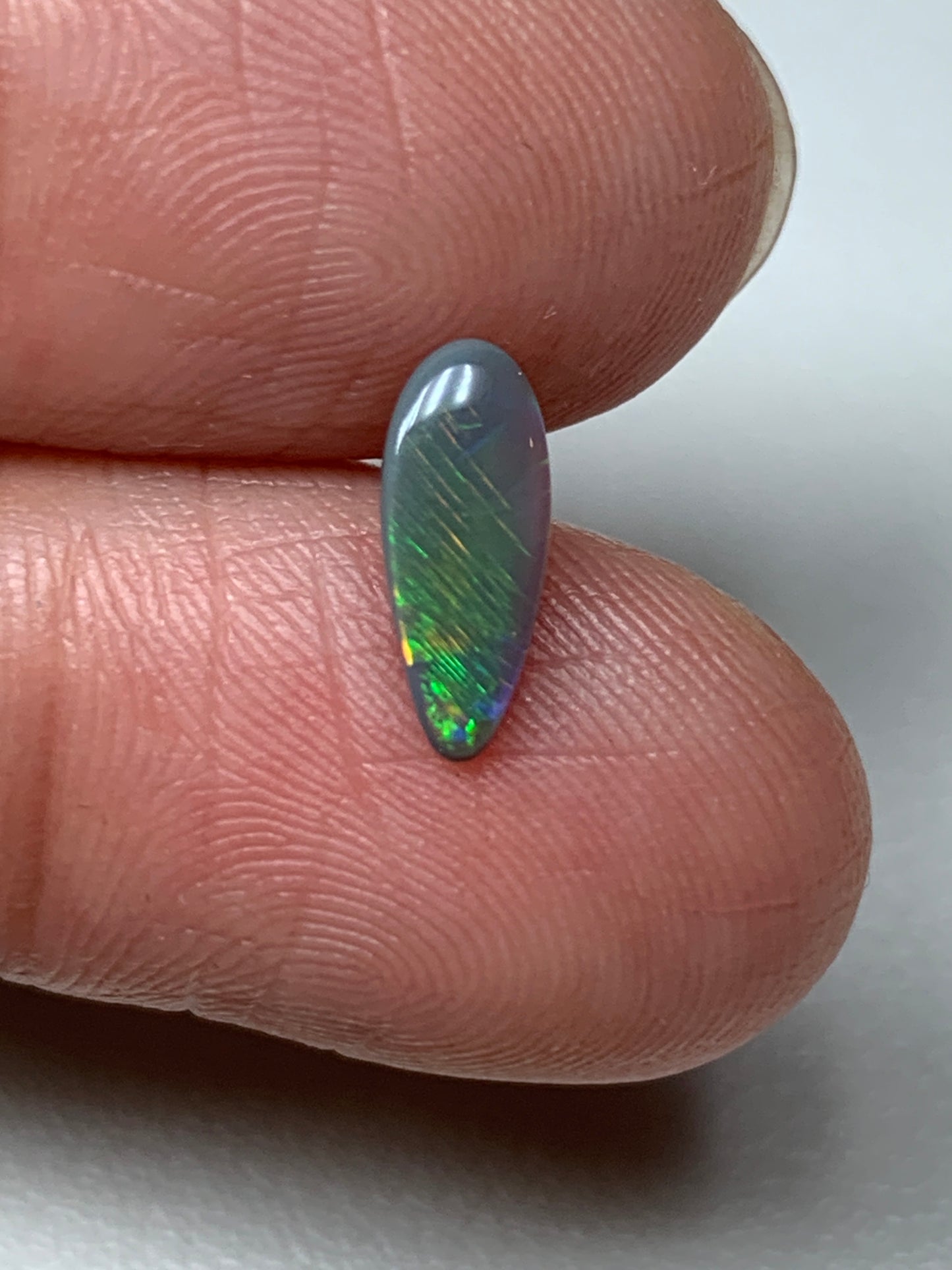 Electric Flashes. Lightning Ridge Black Opal. 0.43 Ct